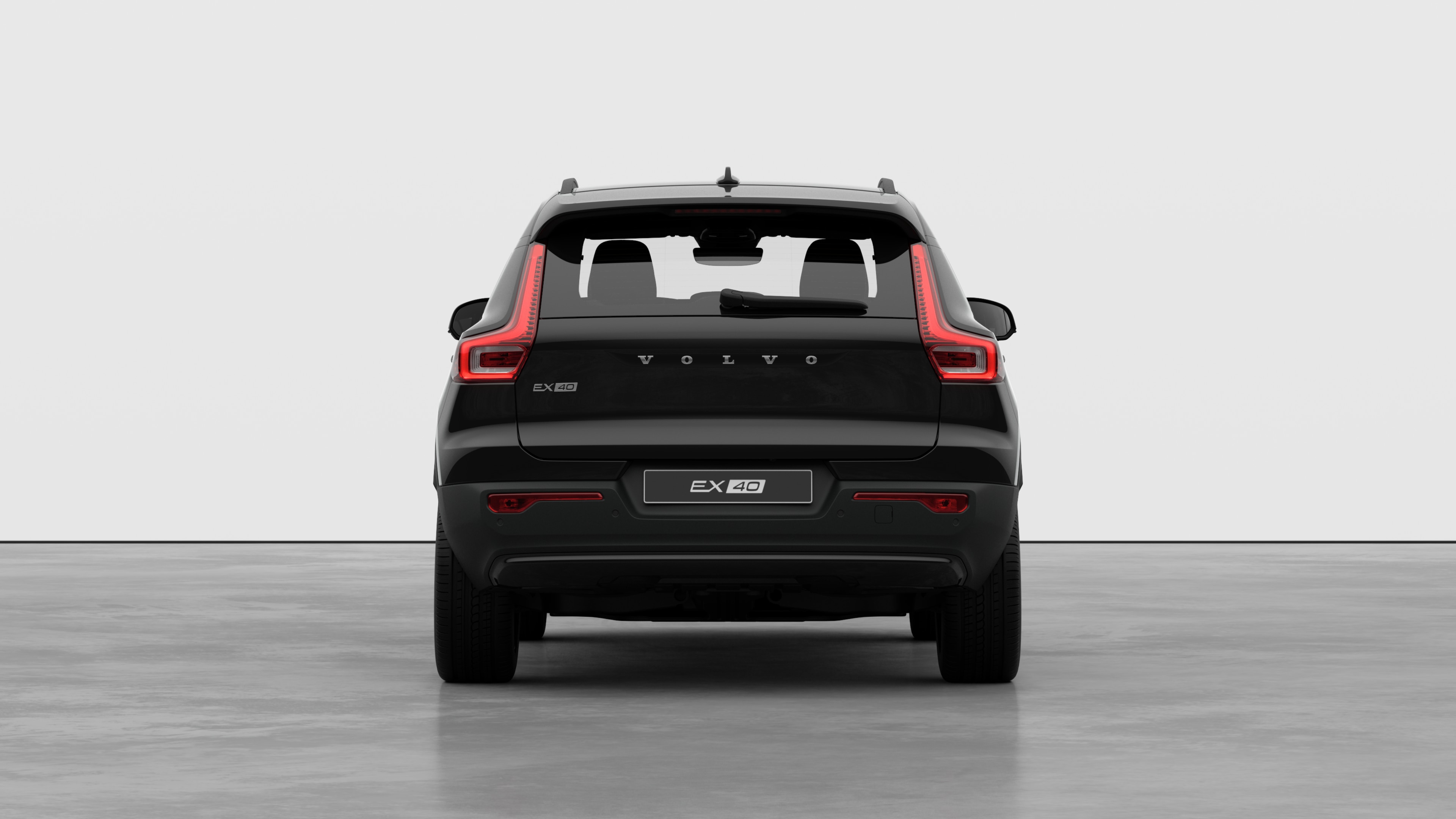 Volvo car rear view against a plain studio background.