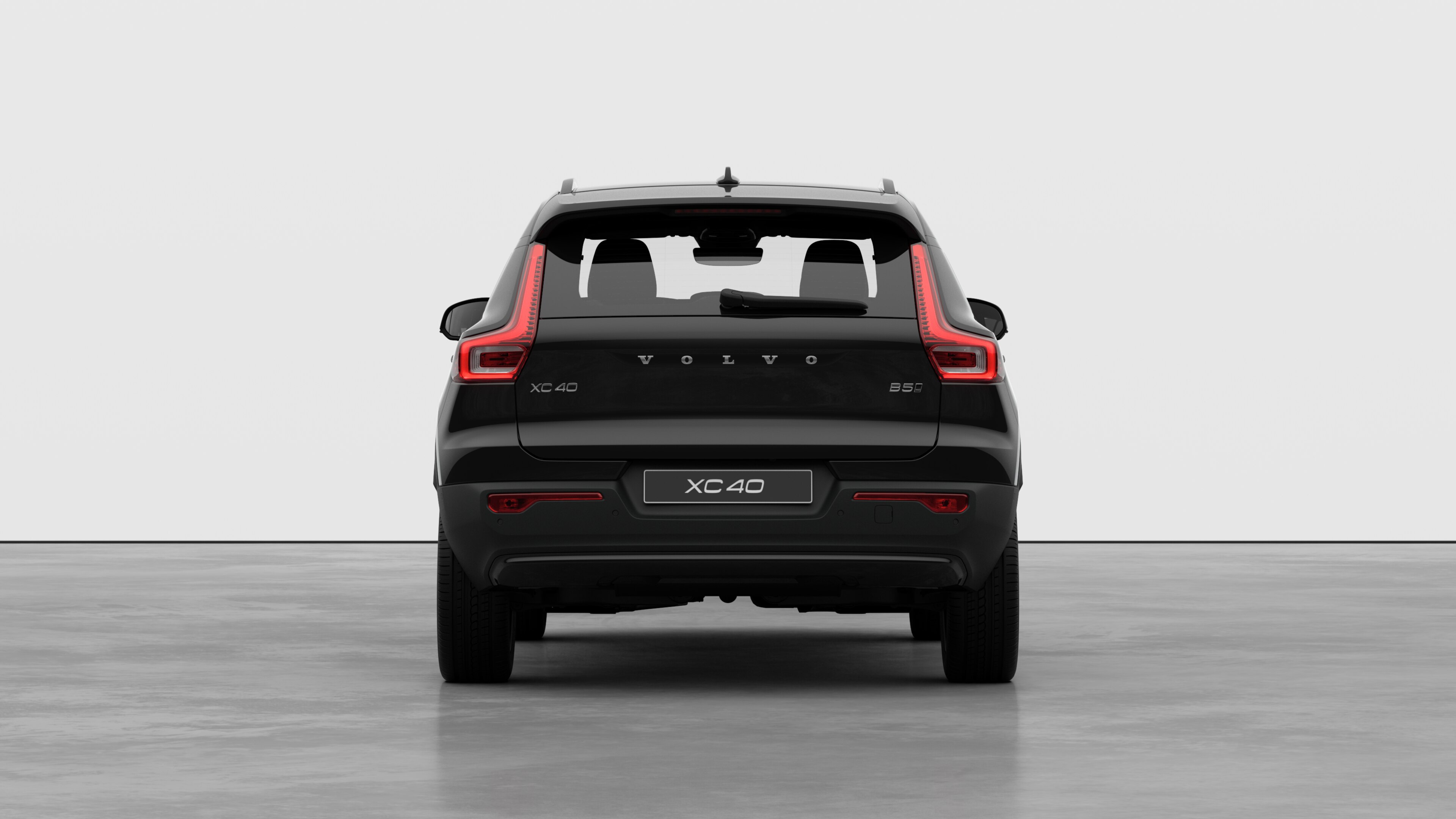 Volvo car rear view against a plain studio background.