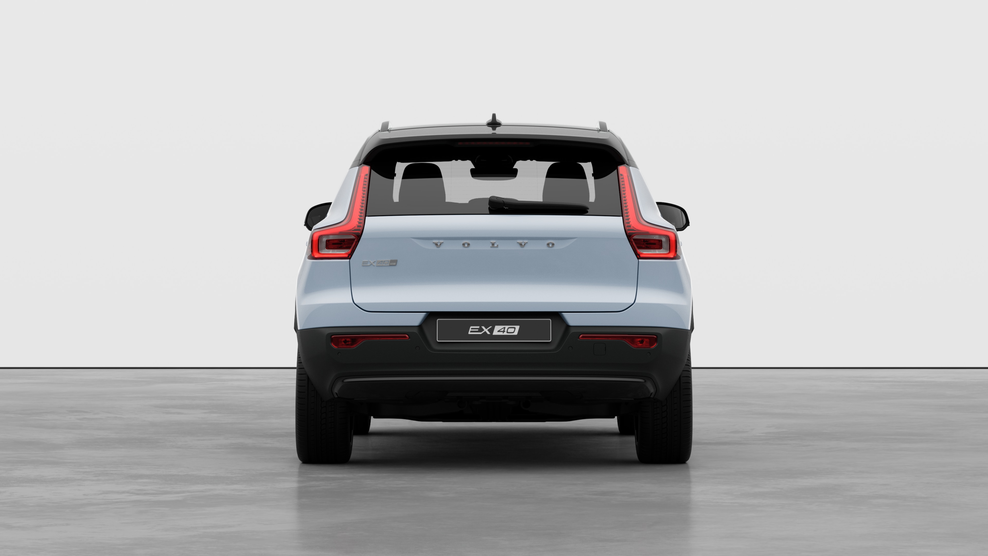 Volvo car rear view against a plain studio background.