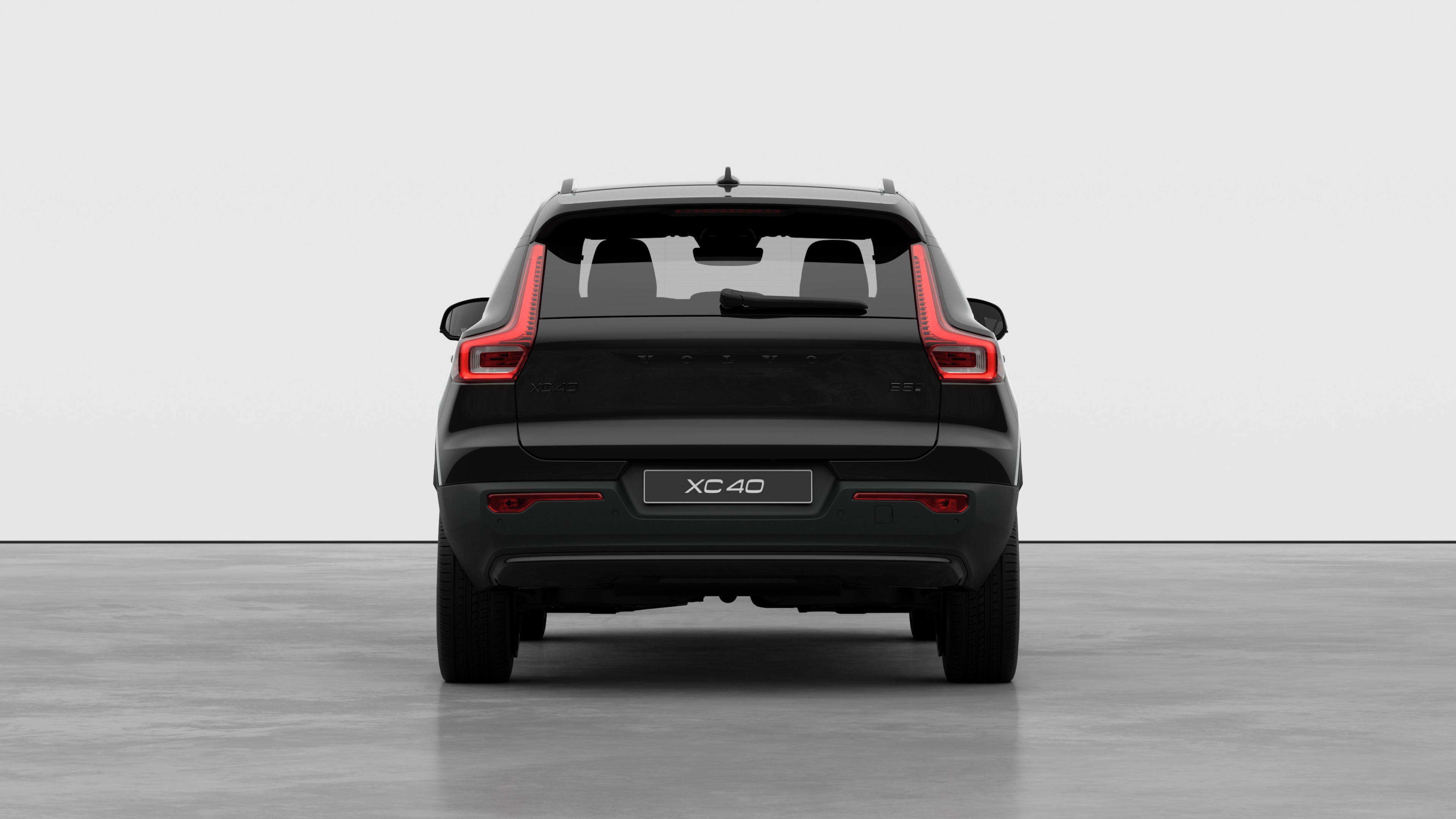 Volvo car rear view against a plain studio background.