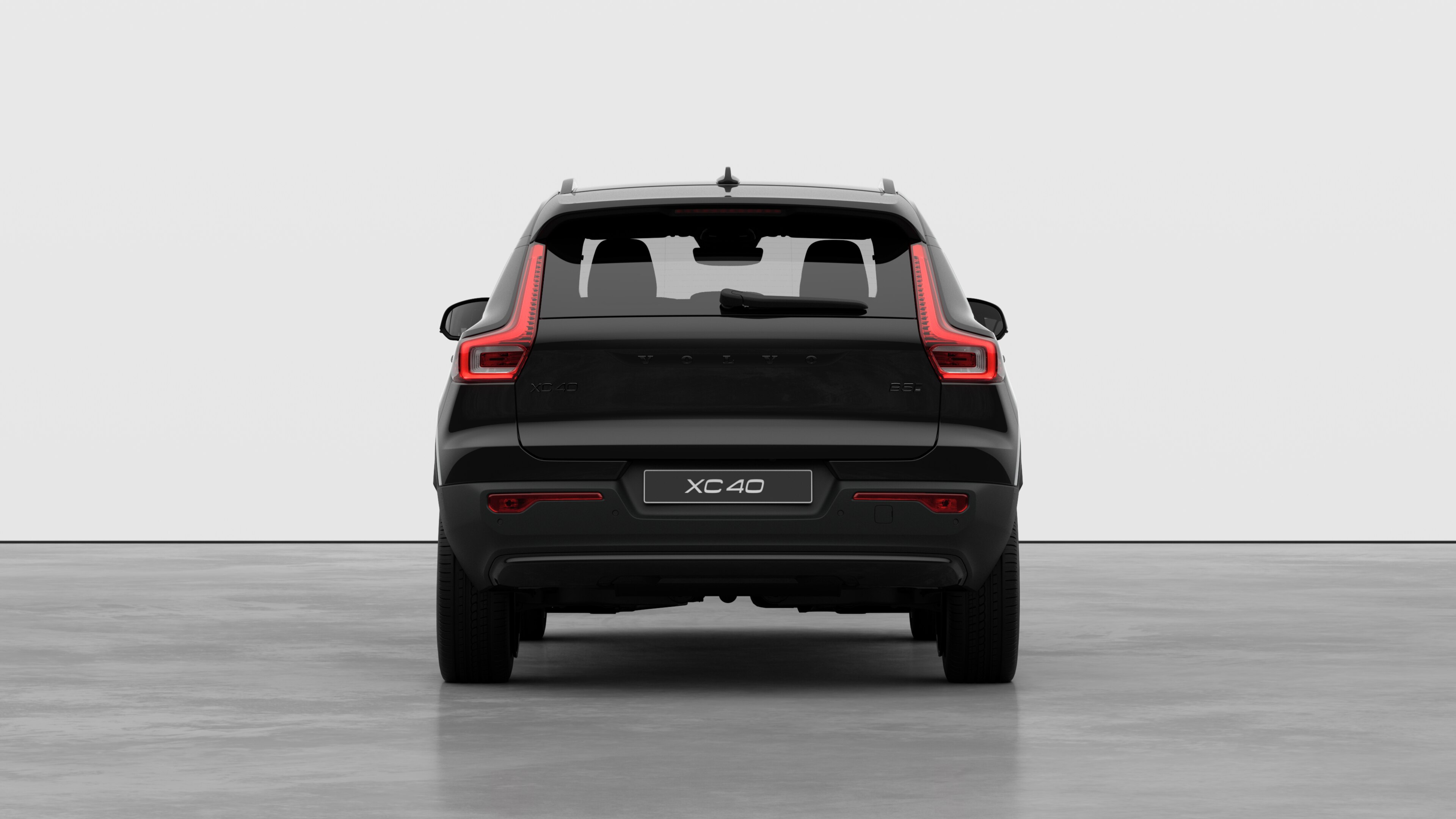 Volvo car rear view against a plain studio background.