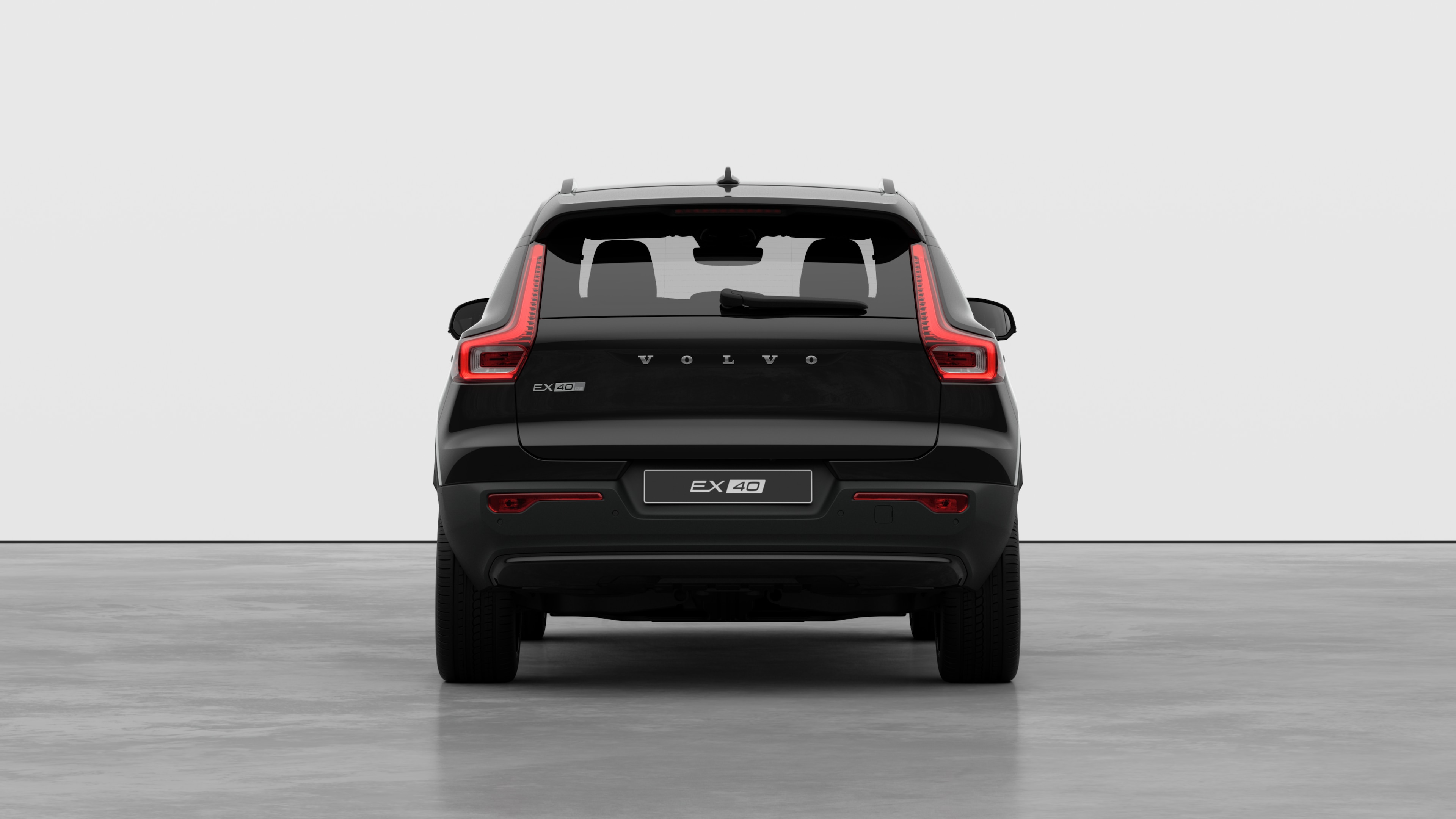 Volvo car rear view against a plain studio background.