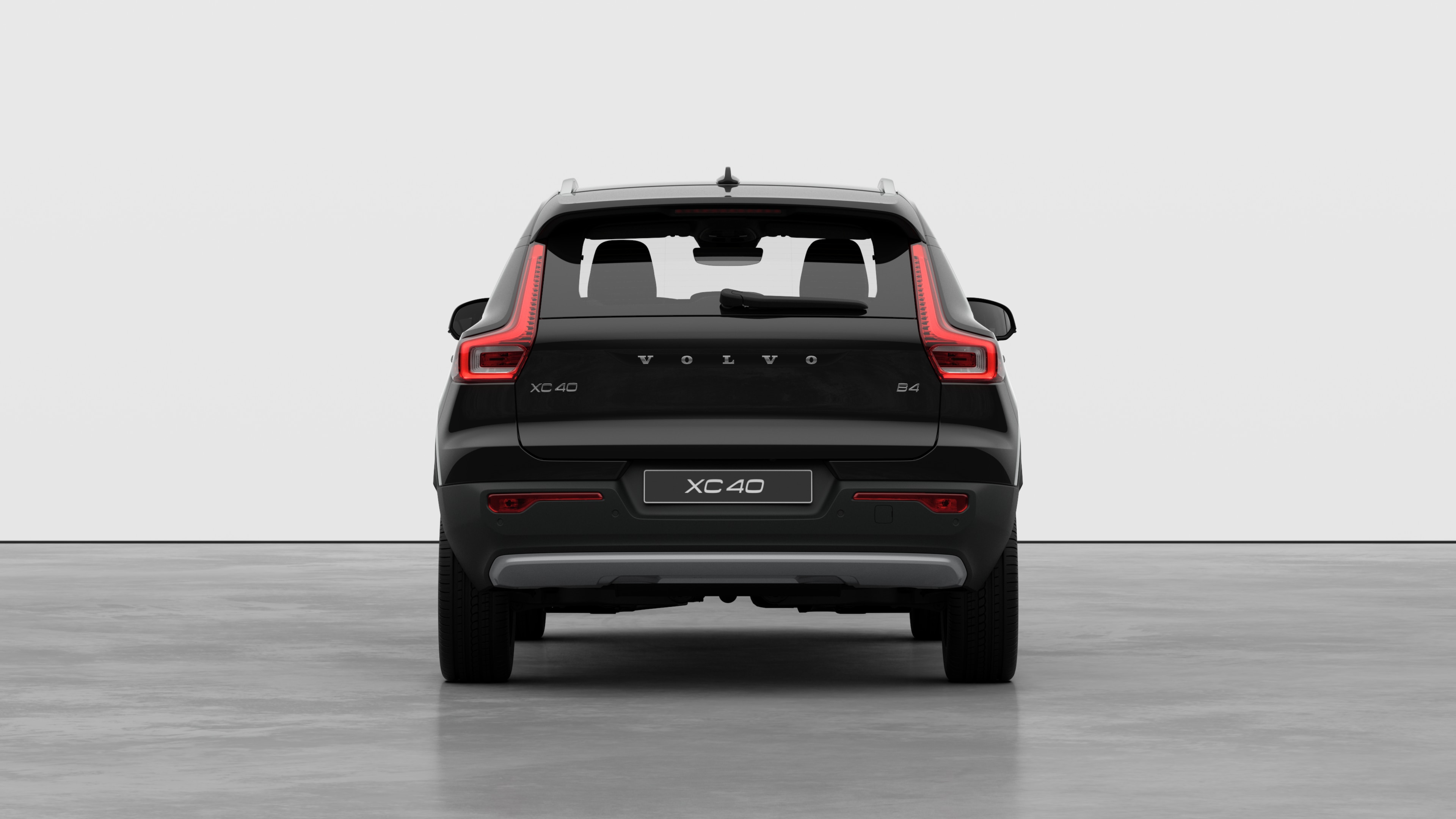 Volvo car rear view against a plain studio background.