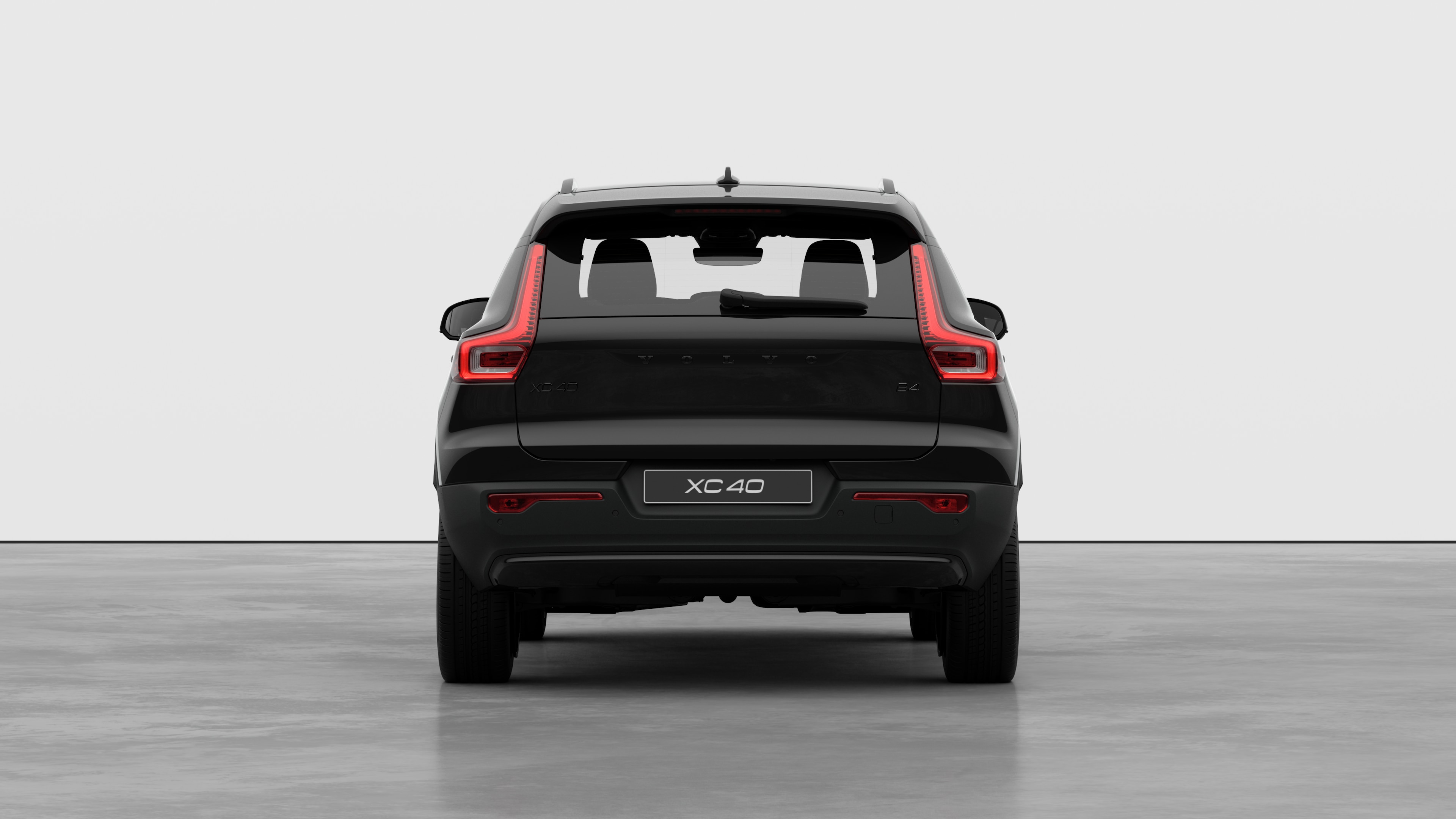 Volvo car rear view against a plain studio background.