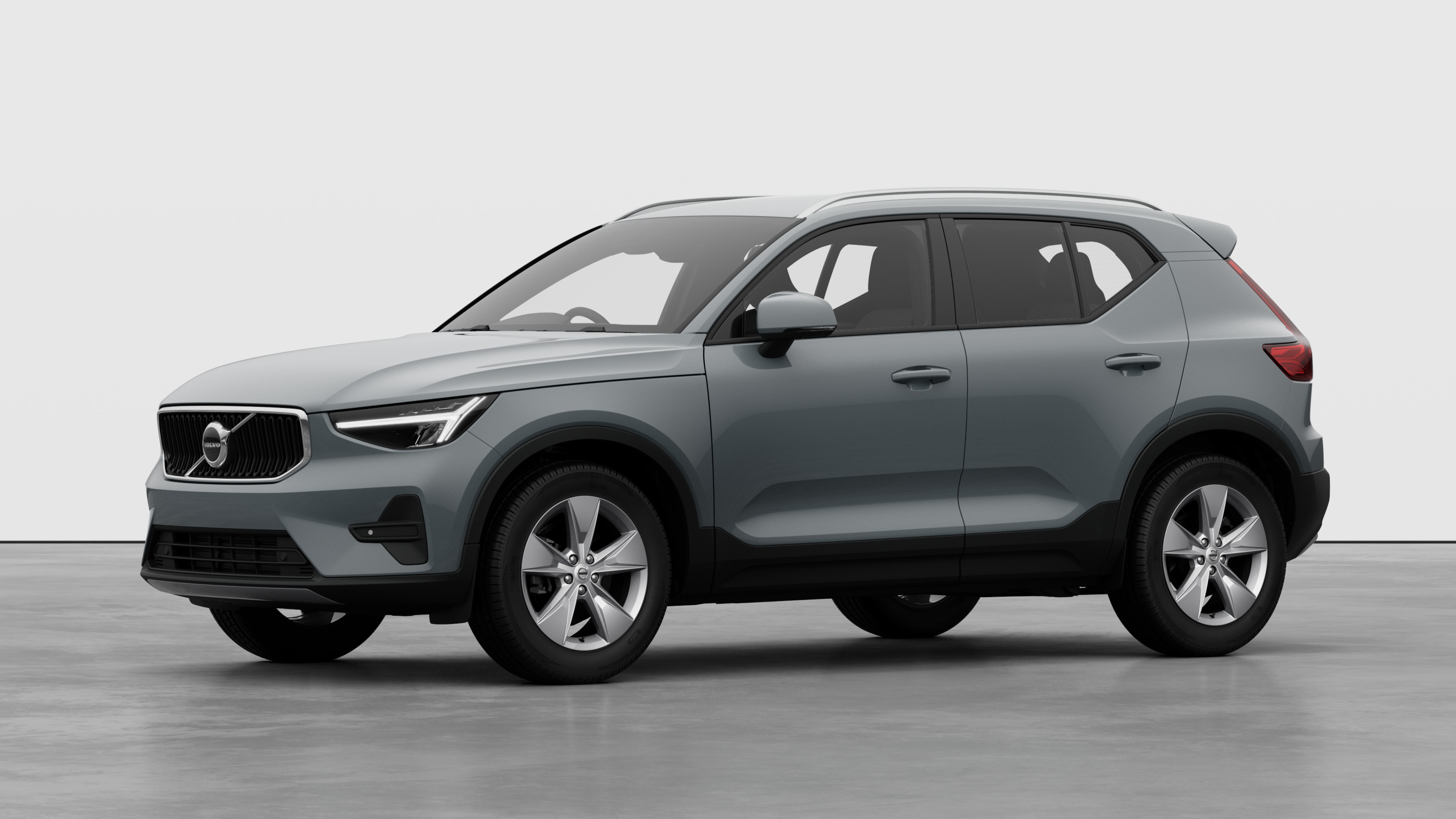 Volvo car exterior in three-quarter view, plain studio background.
