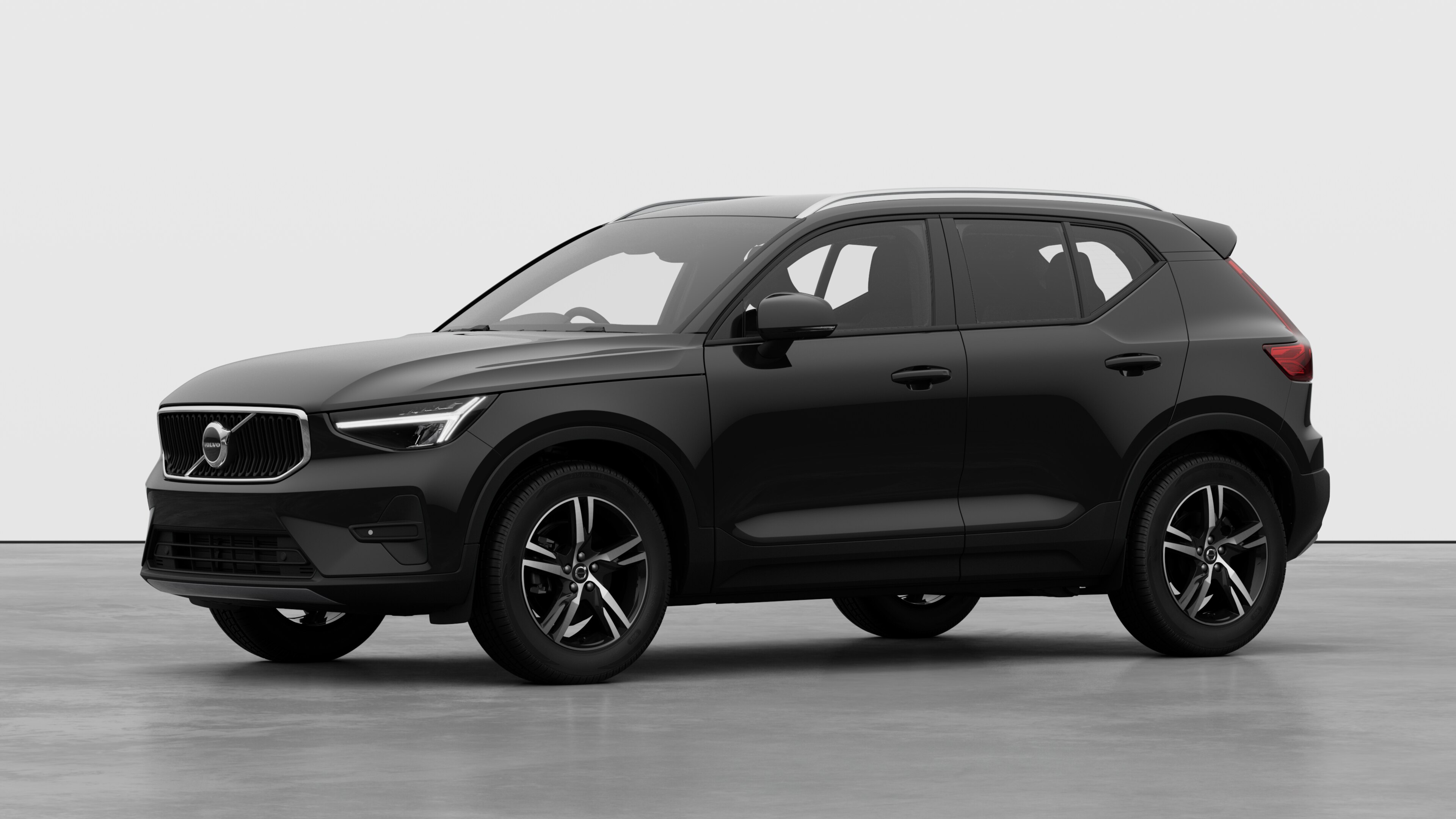 Volvo car exterior in three-quarter view, plain studio background.