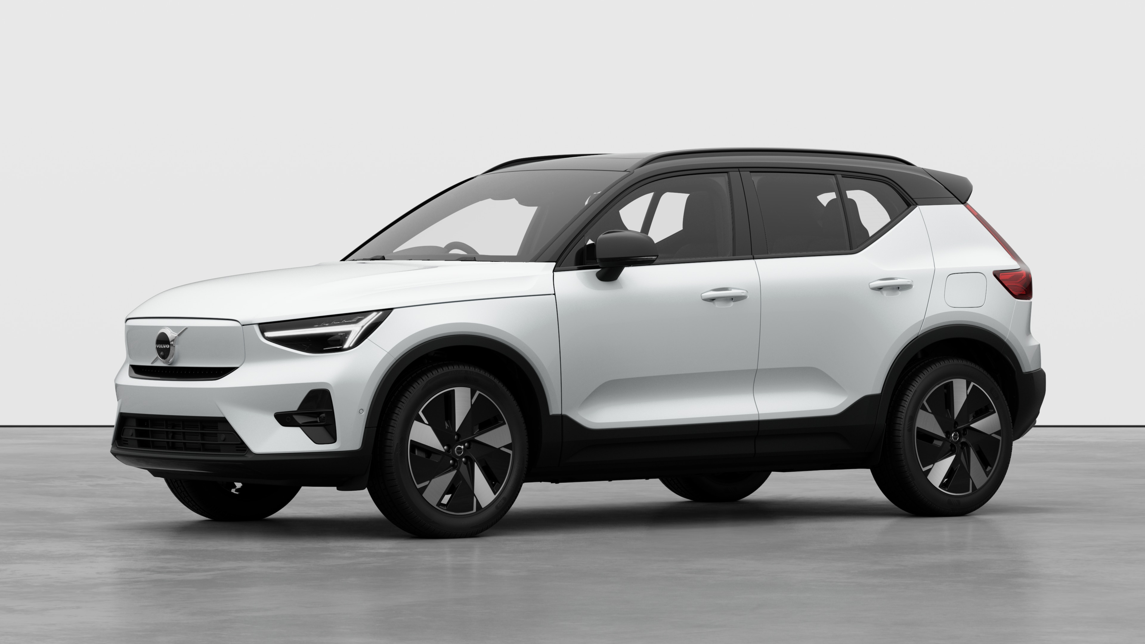 Volvo car exterior in three-quarter view, plain studio background.