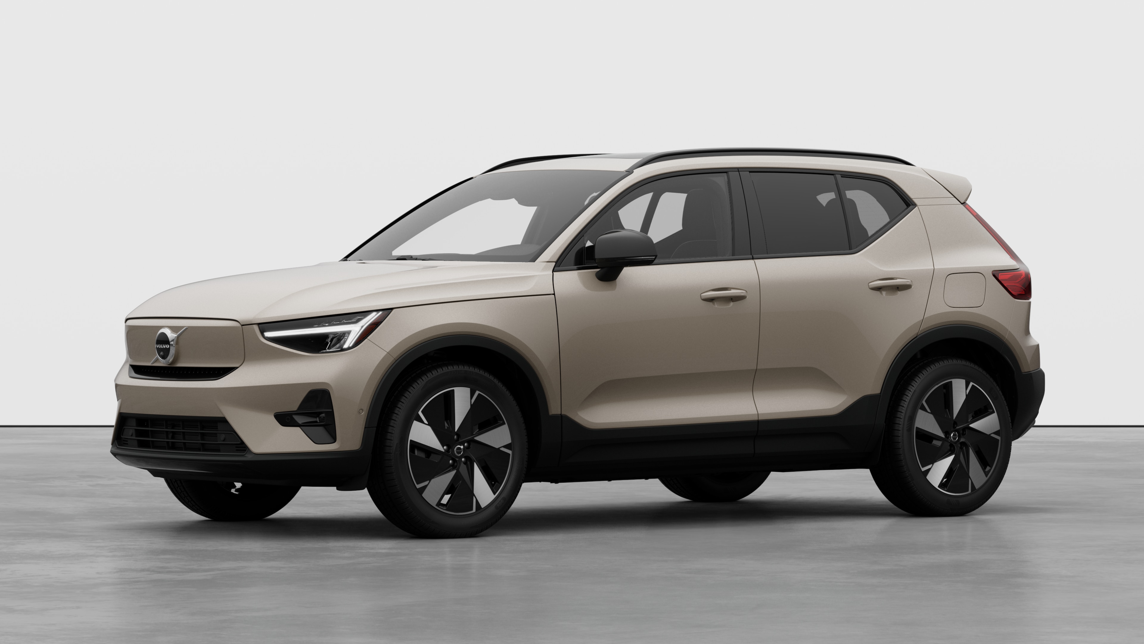 Volvo car exterior in three-quarter view, plain studio background.