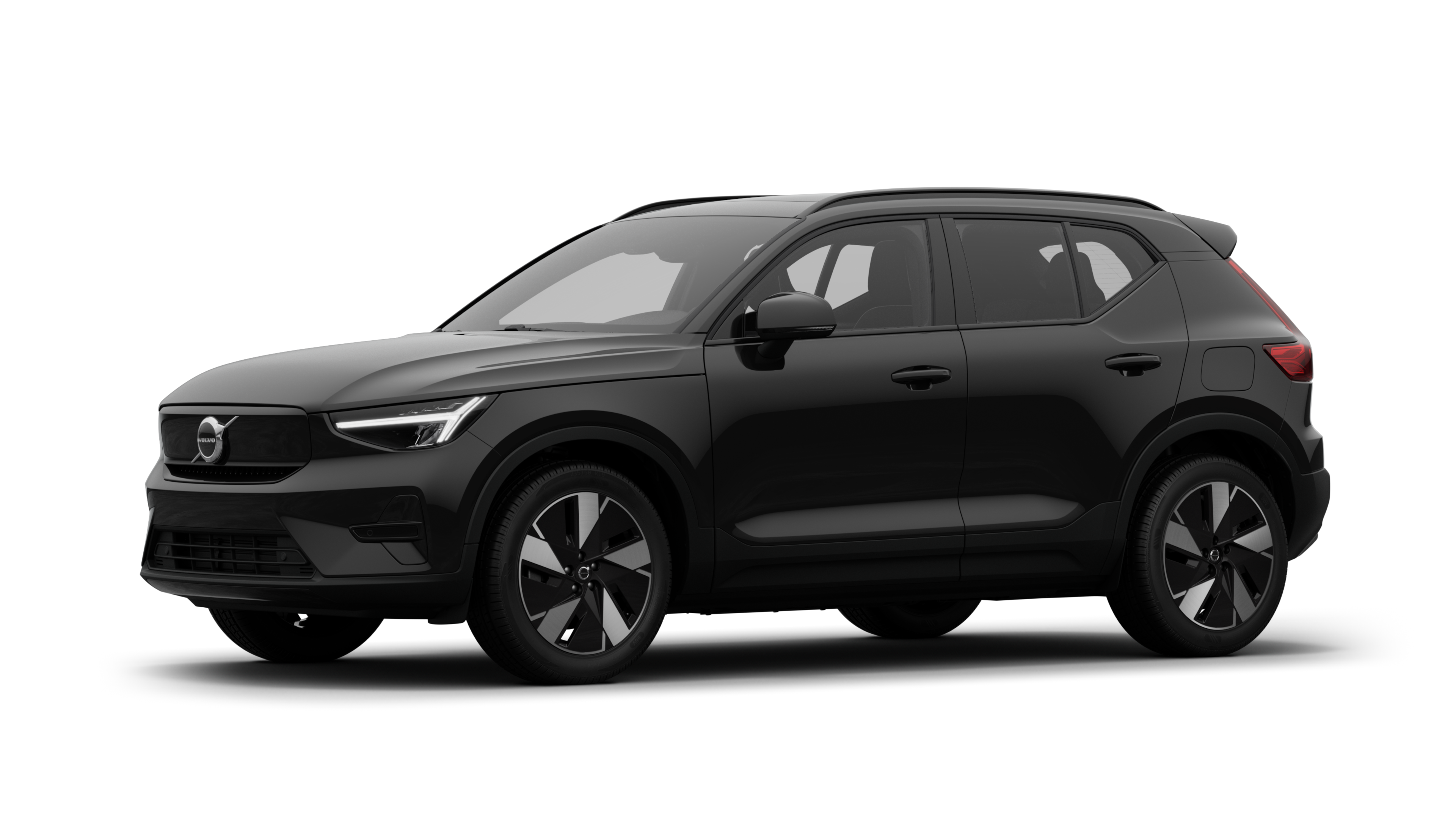 Exterior del vehículo Volvo en vista de tres cuartos, fondo de estudio liso.