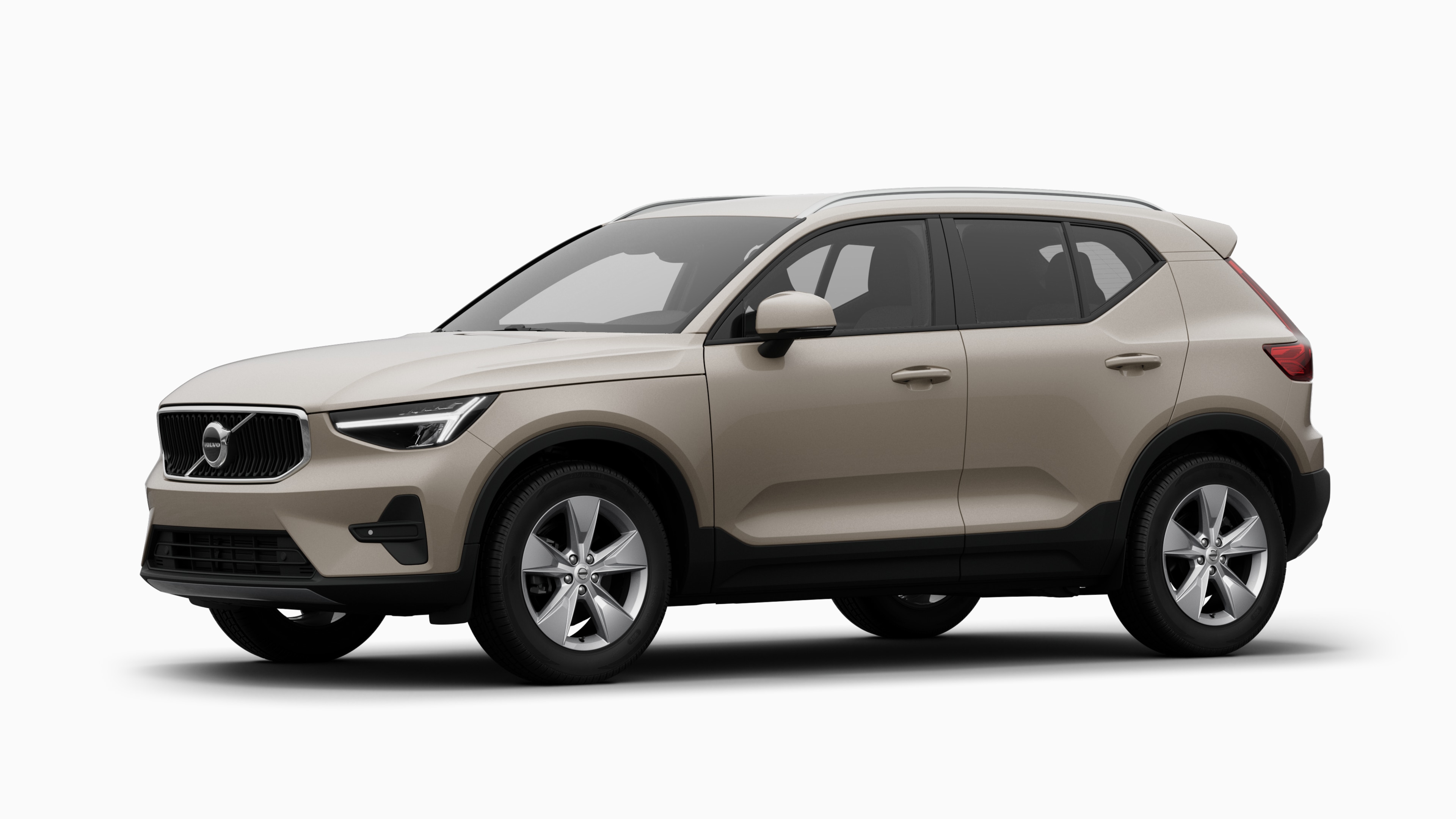 Volvo avtomobil eksteryer üç dörddə bir baxışda, sadə studiya fonunda.