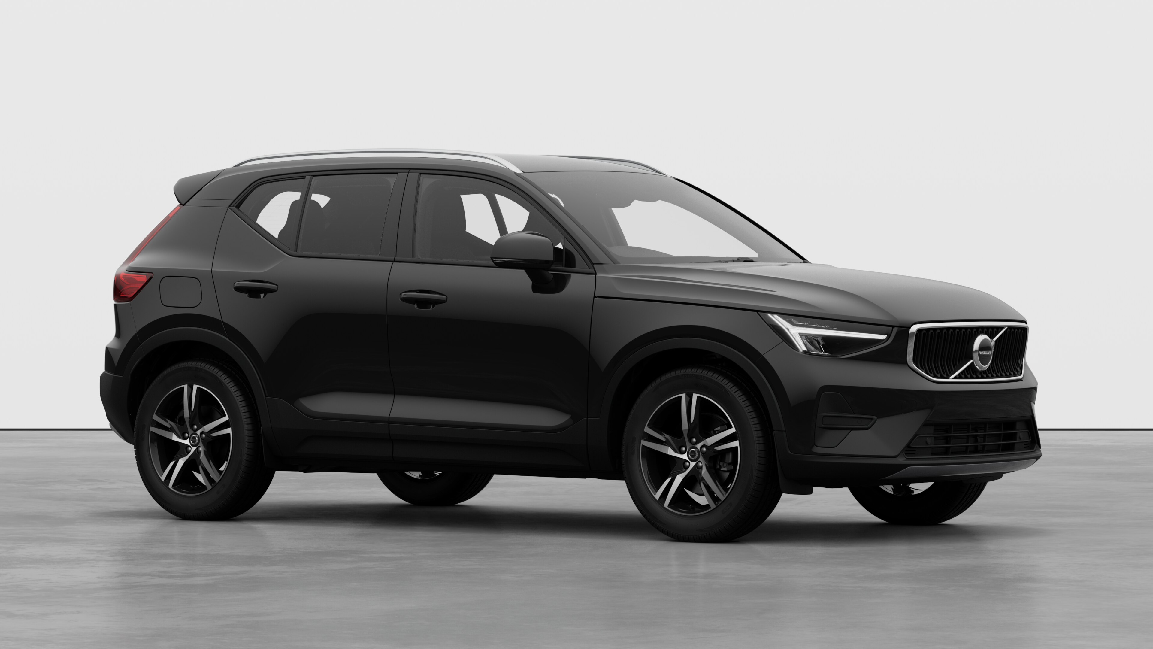 Volvo car exterior, three-quarter view in a plain studio background.