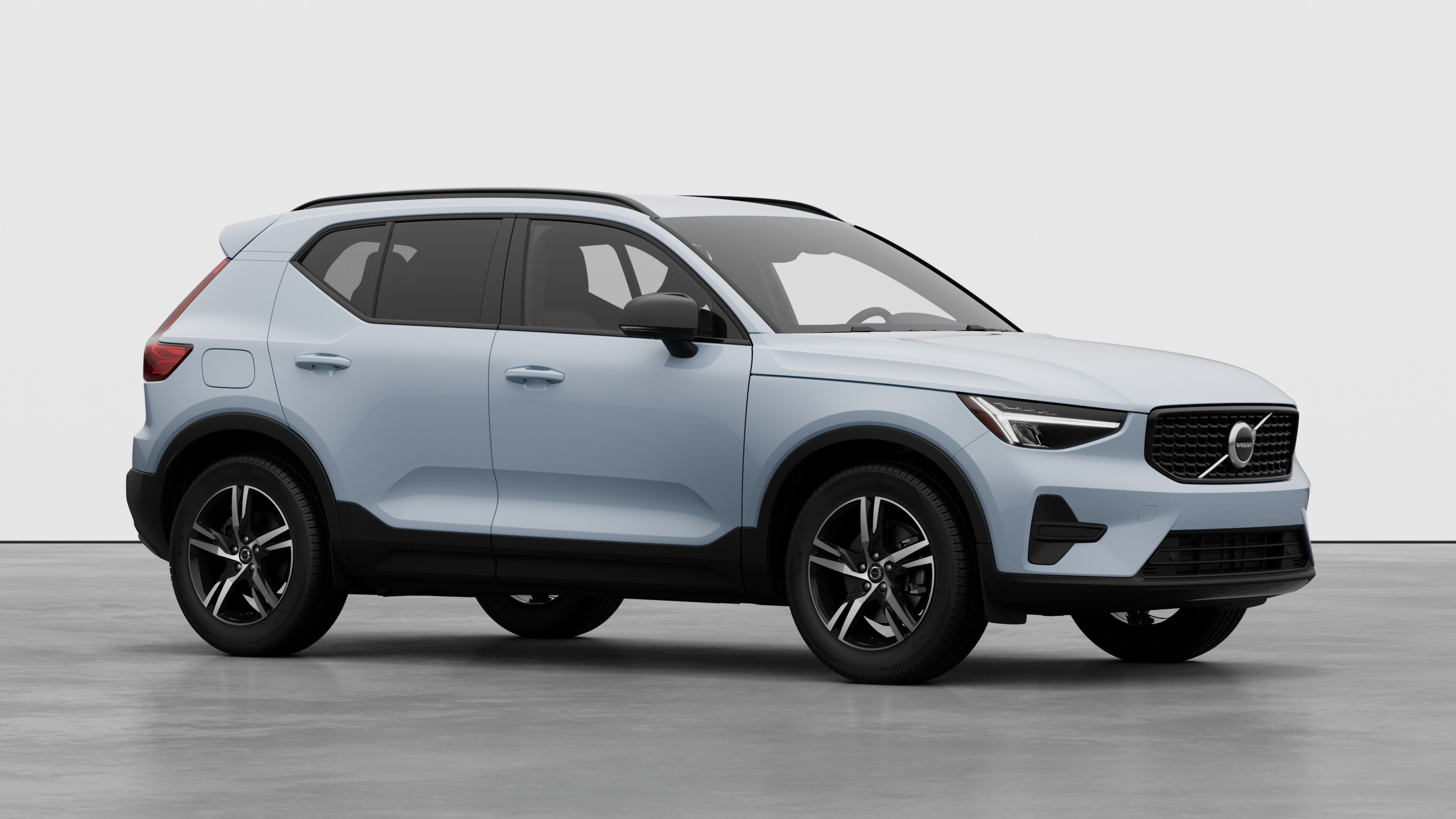 Volvo car exterior, three-quarter view in a plain studio background.