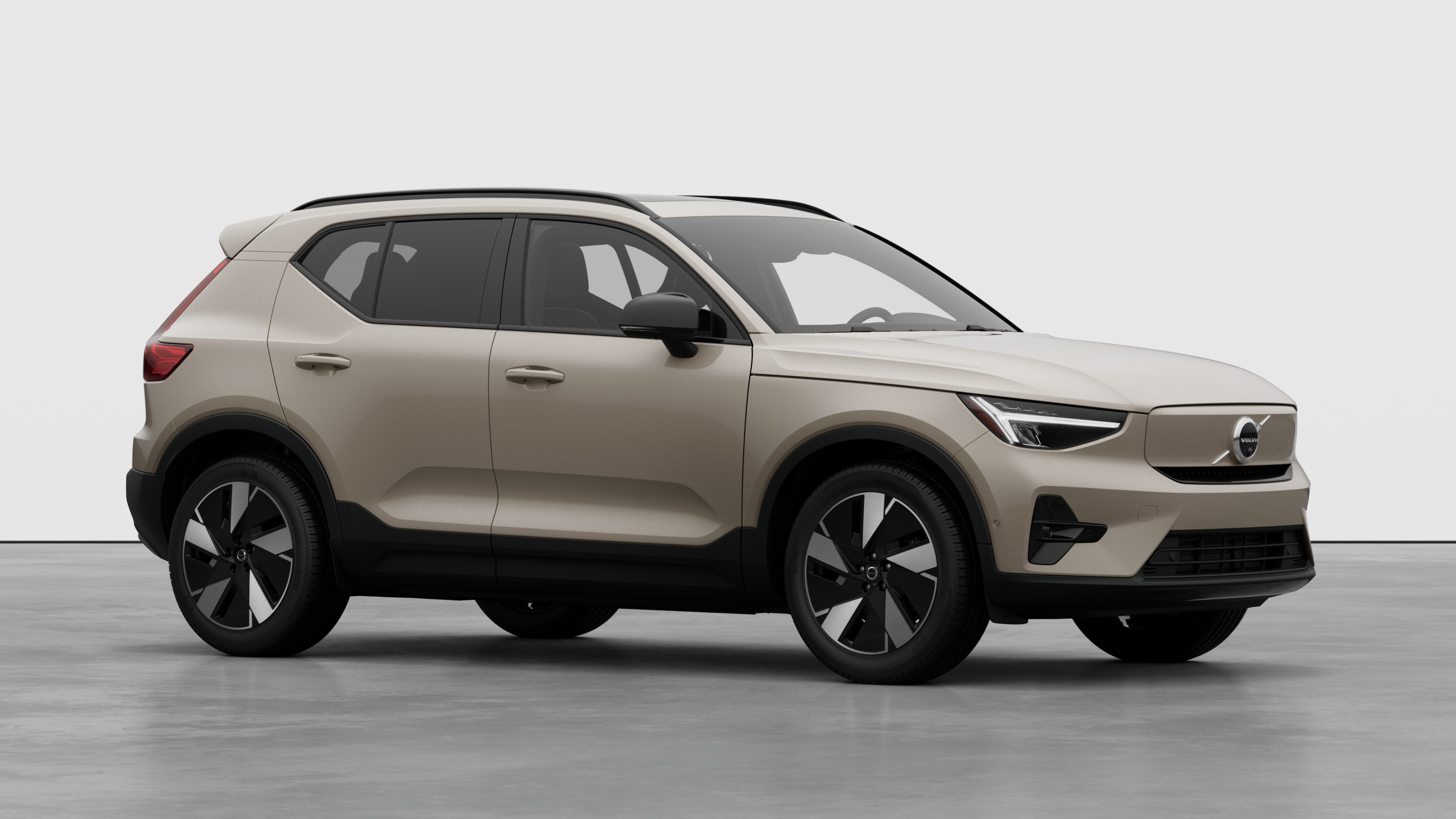 Volvo car exterior, three-quarter view in a plain studio background.