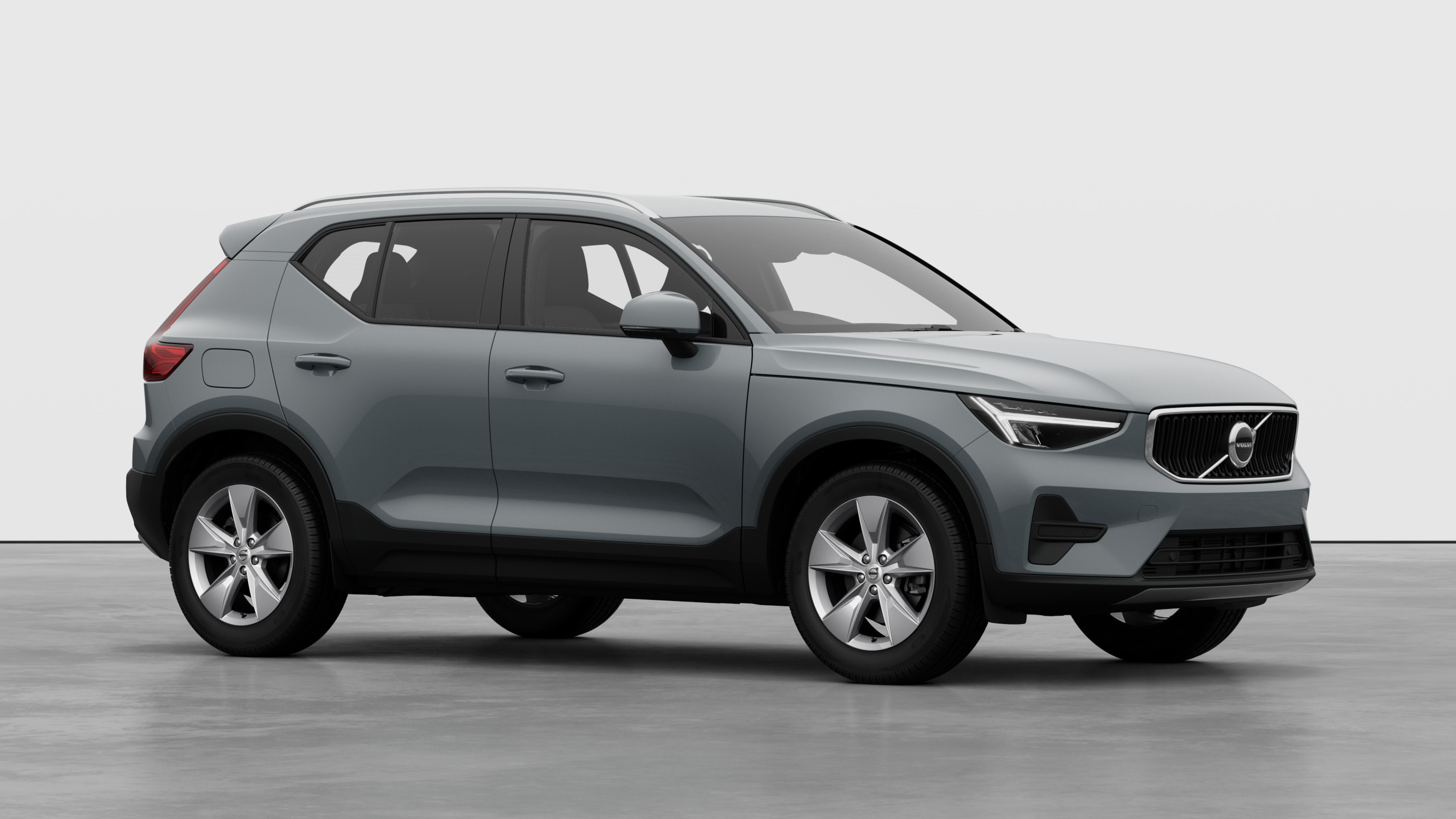 Volvo car exterior, three-quarter view in a plain studio background.