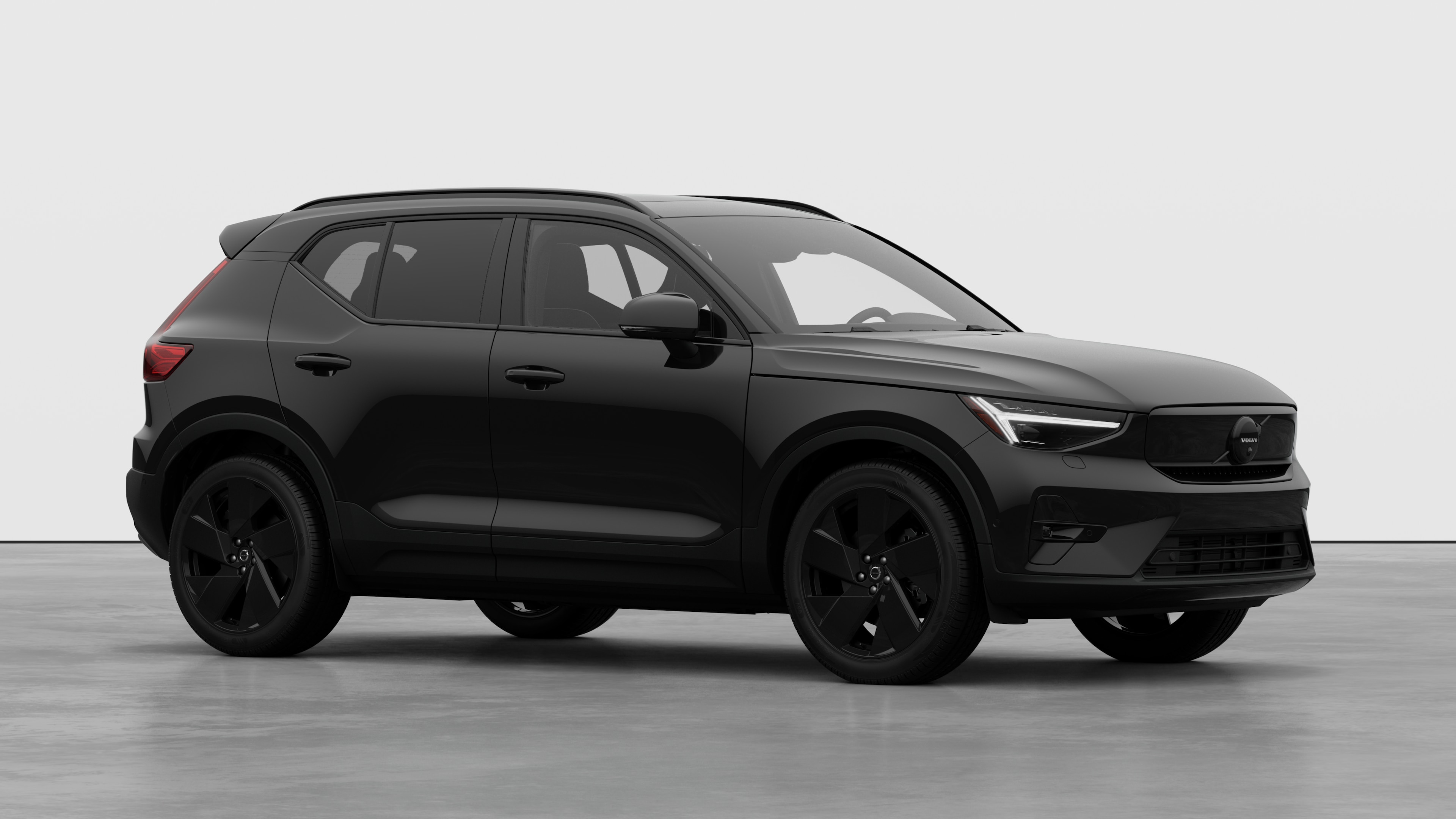Volvo car exterior, three-quarter view in a plain studio background.