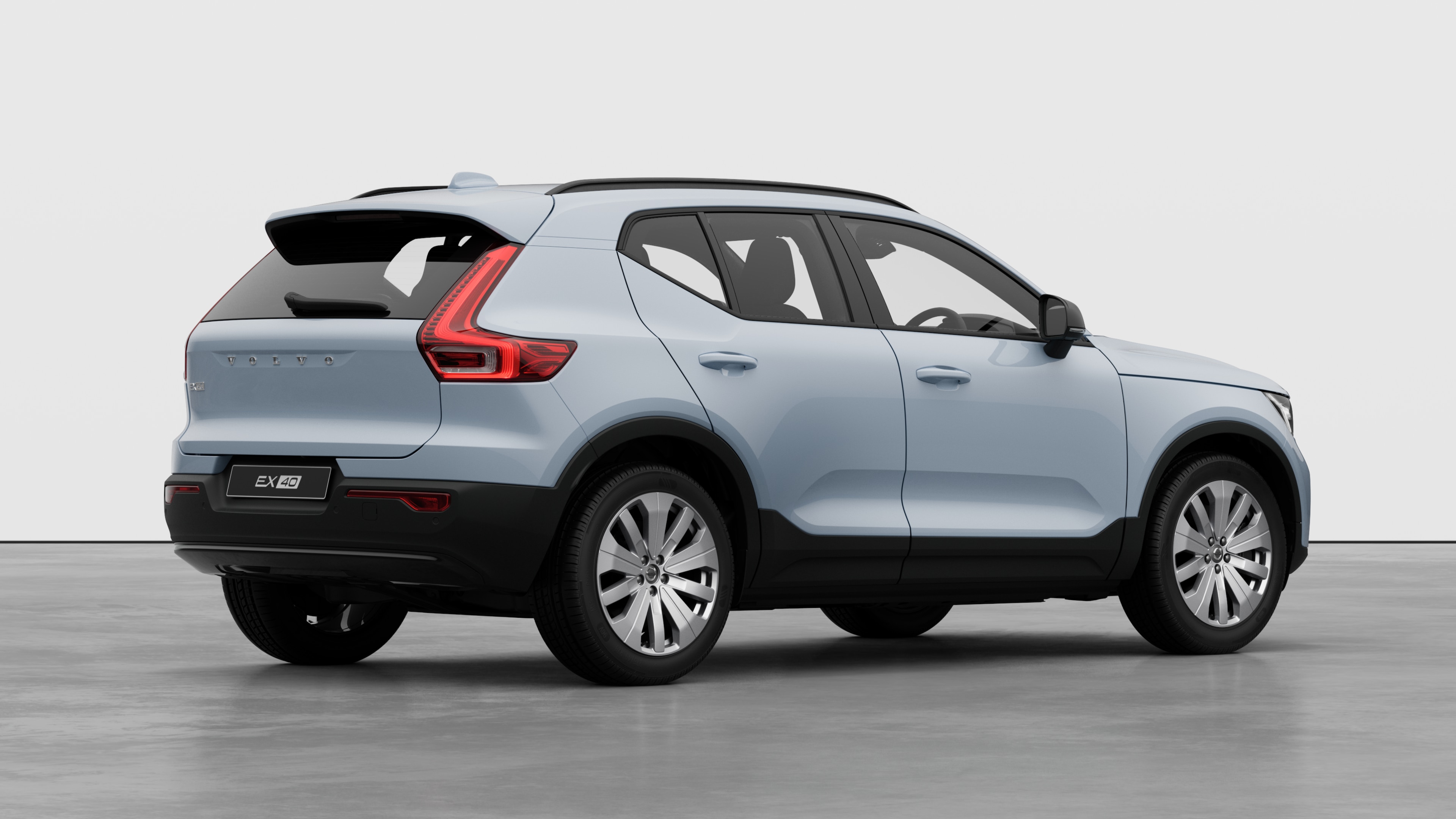 Volvo car rear three-quarter view on plain studio background.