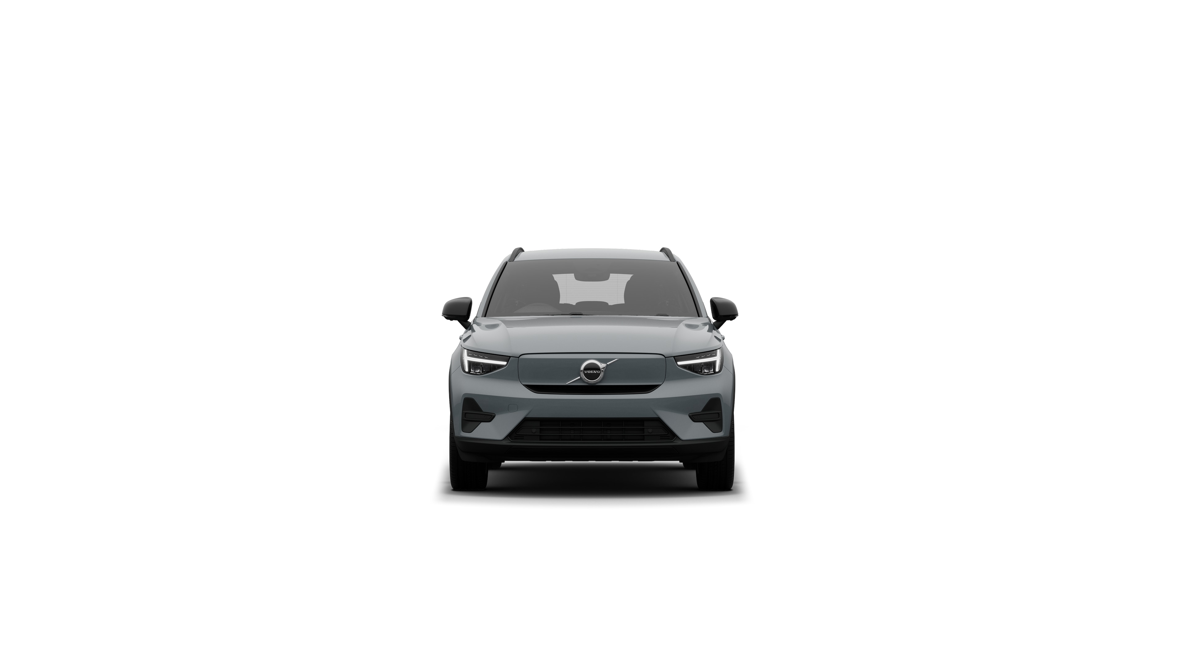 Volvo car front view in a plain studio background.