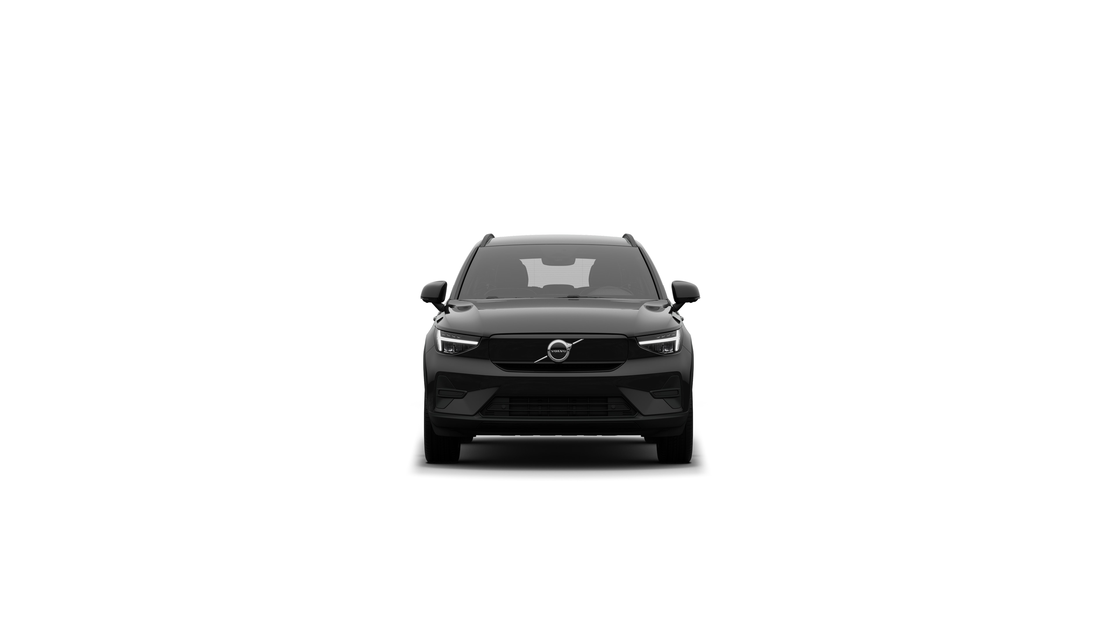 Vista frontal del vehículo Volvo en un fondo de estudio liso.