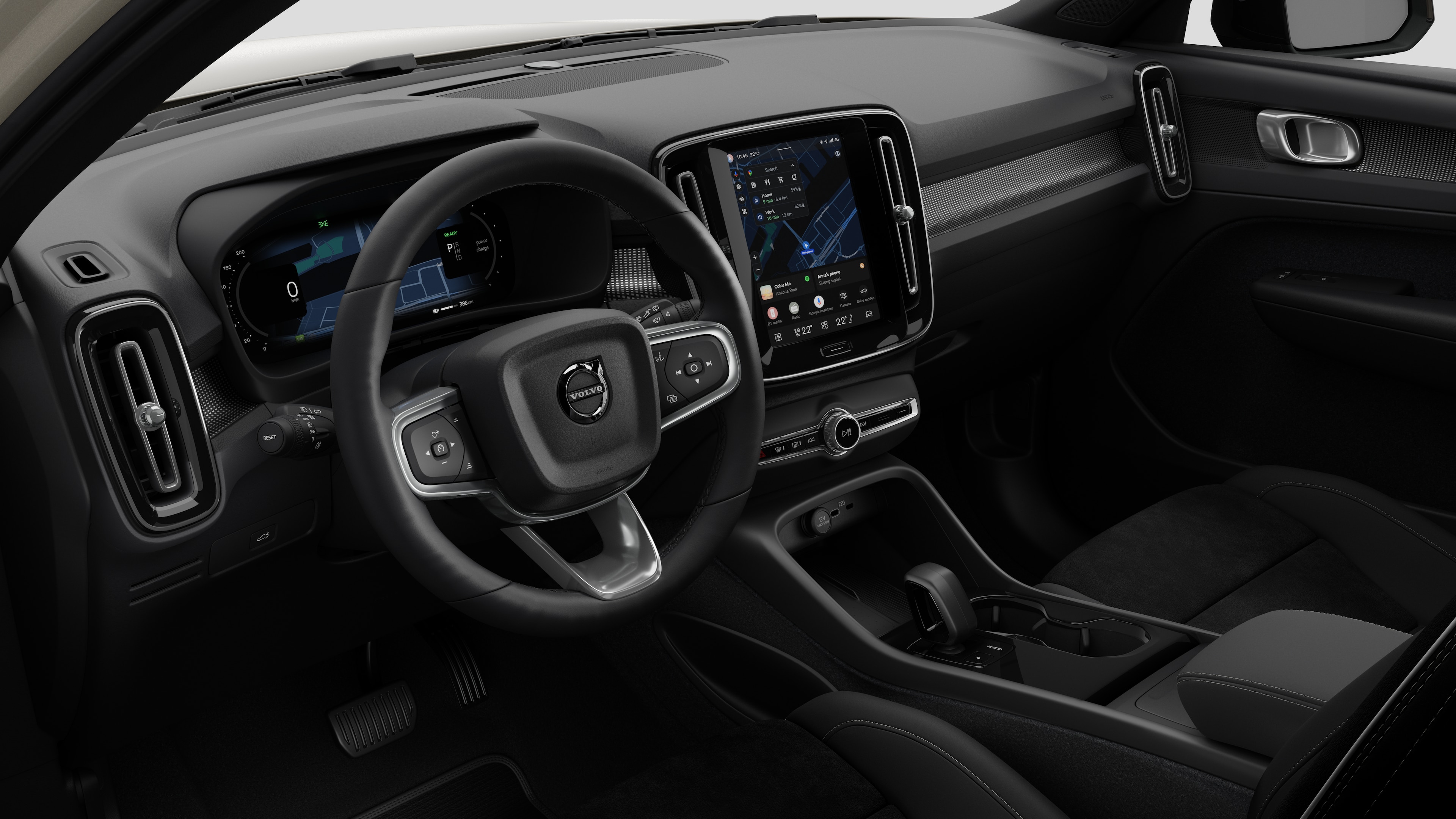 Volvo 汽車的內部視圖，以純色工作室背景顯示儀錶板、方向盤、中控台和數字顯示幕。