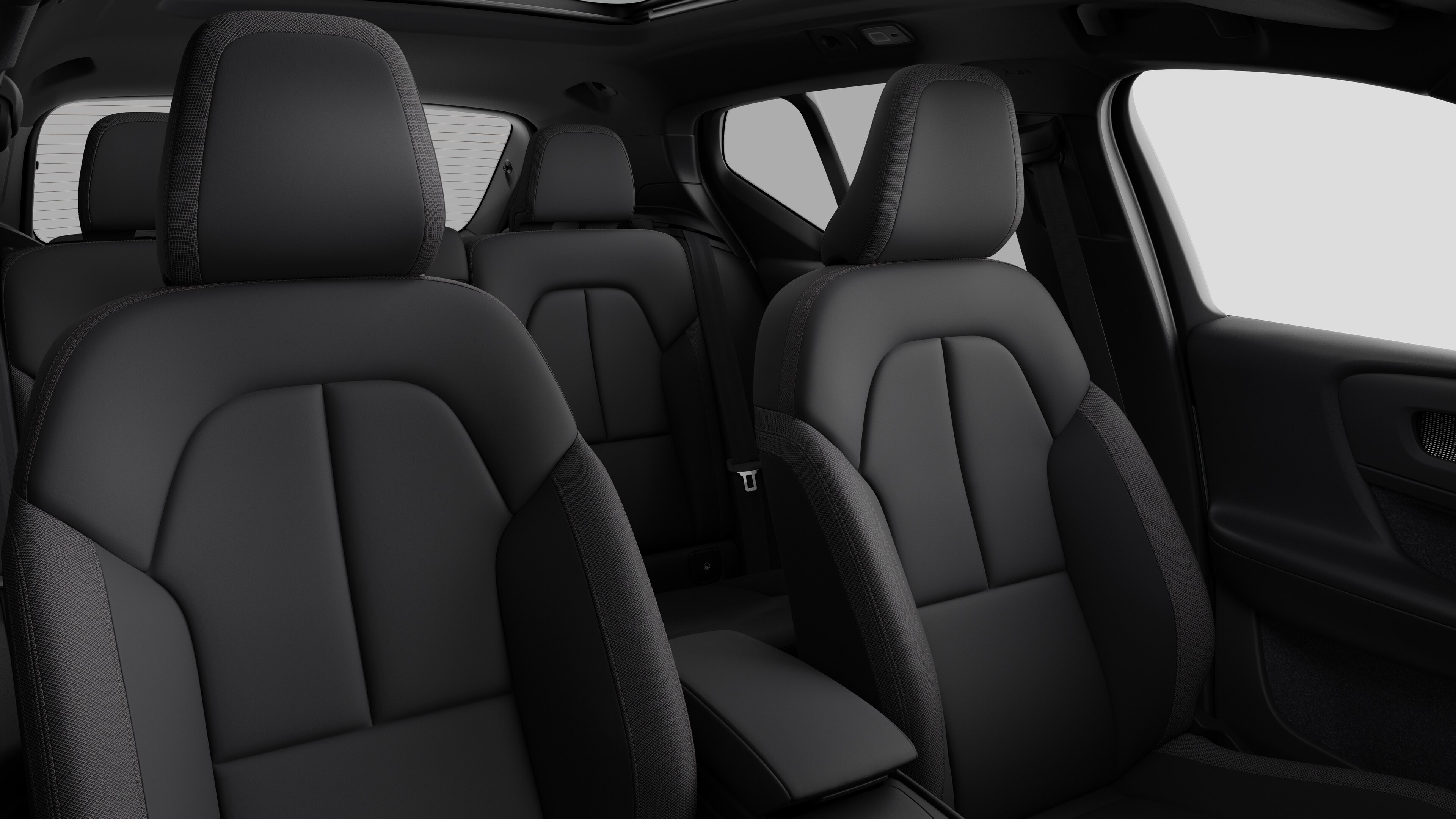 Volvo car interior showing rear passenger seats and center console in plain studio background.