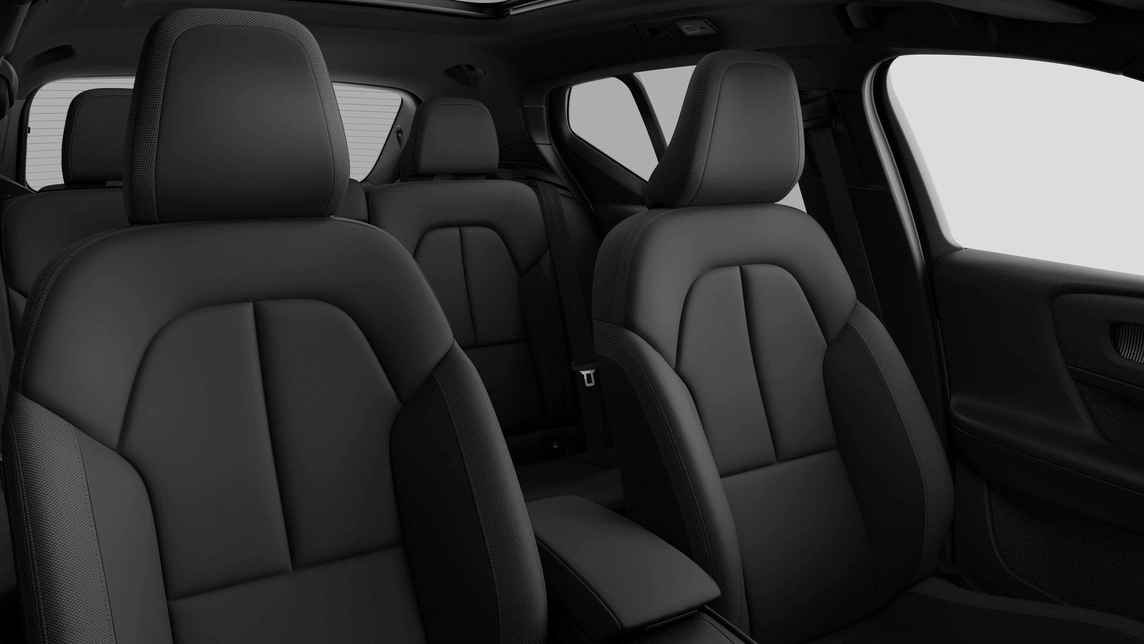 Volvo car interior showing rear passenger seats and center console in plain studio background.