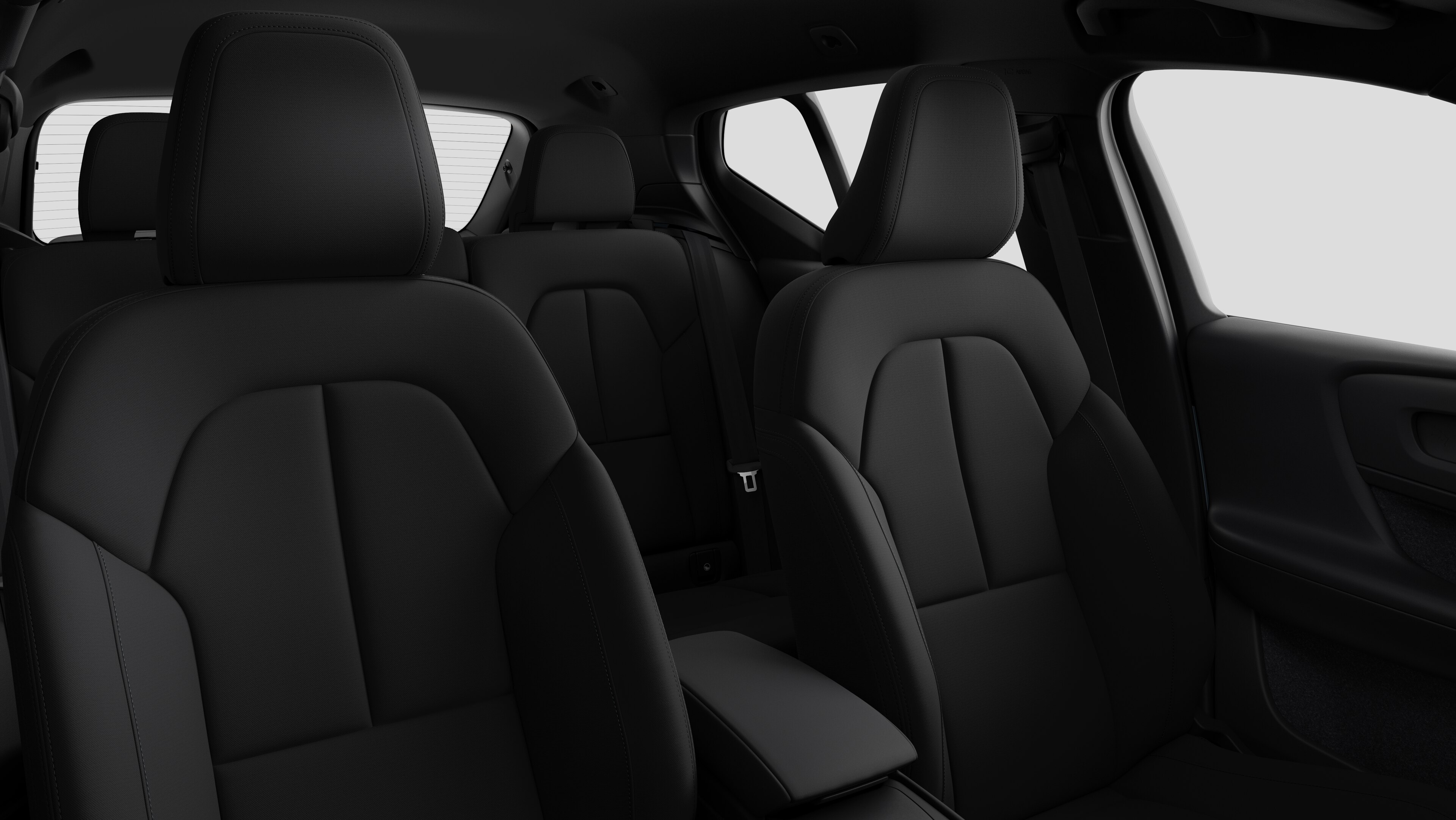 Volvo car interior showing rear passenger seats and center console in plain studio background.