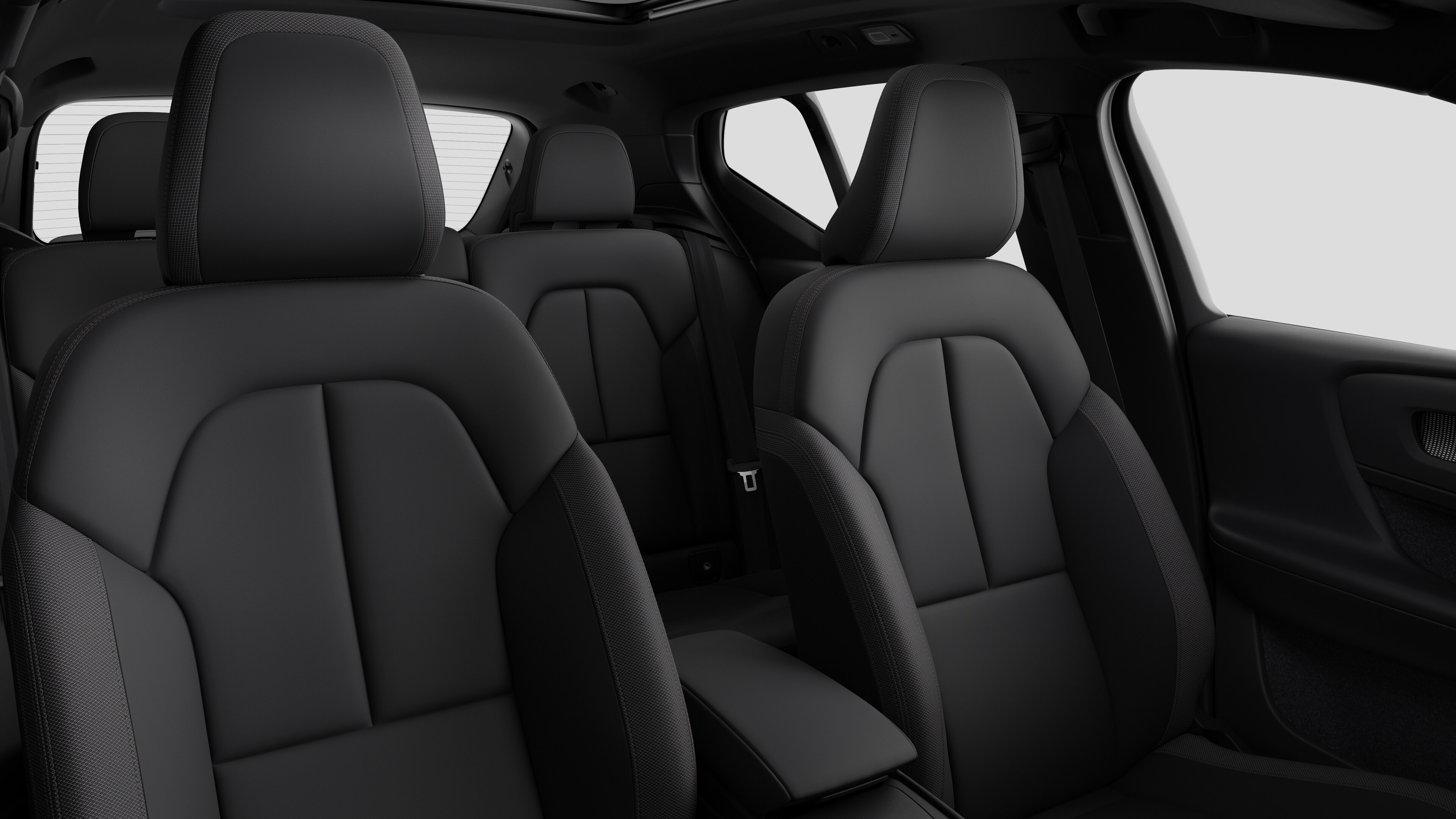 Volvo car interior showing rear passenger seats and center console in plain studio background.