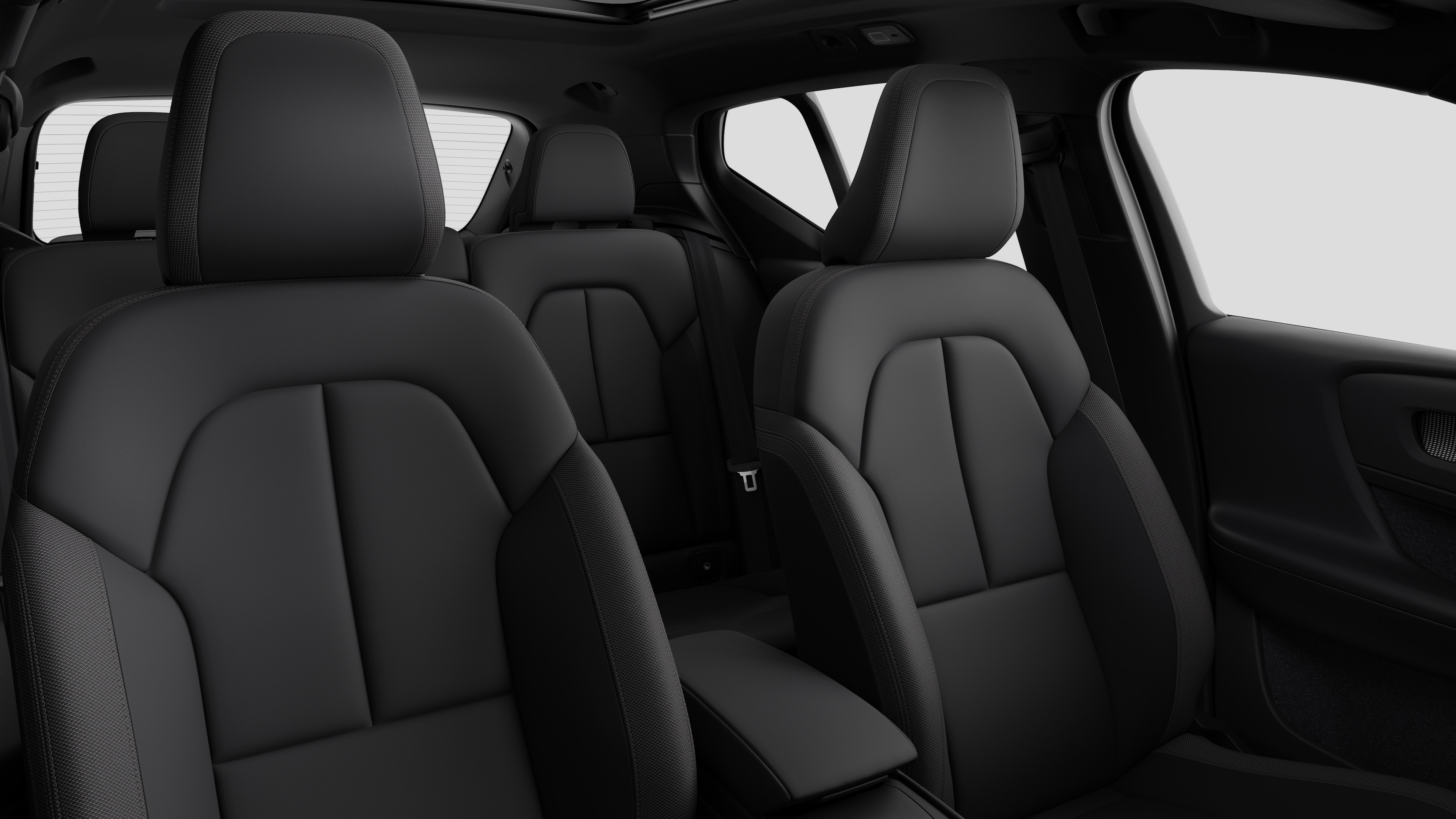 Volvo car interior showing rear passenger seats and center console in plain studio background.