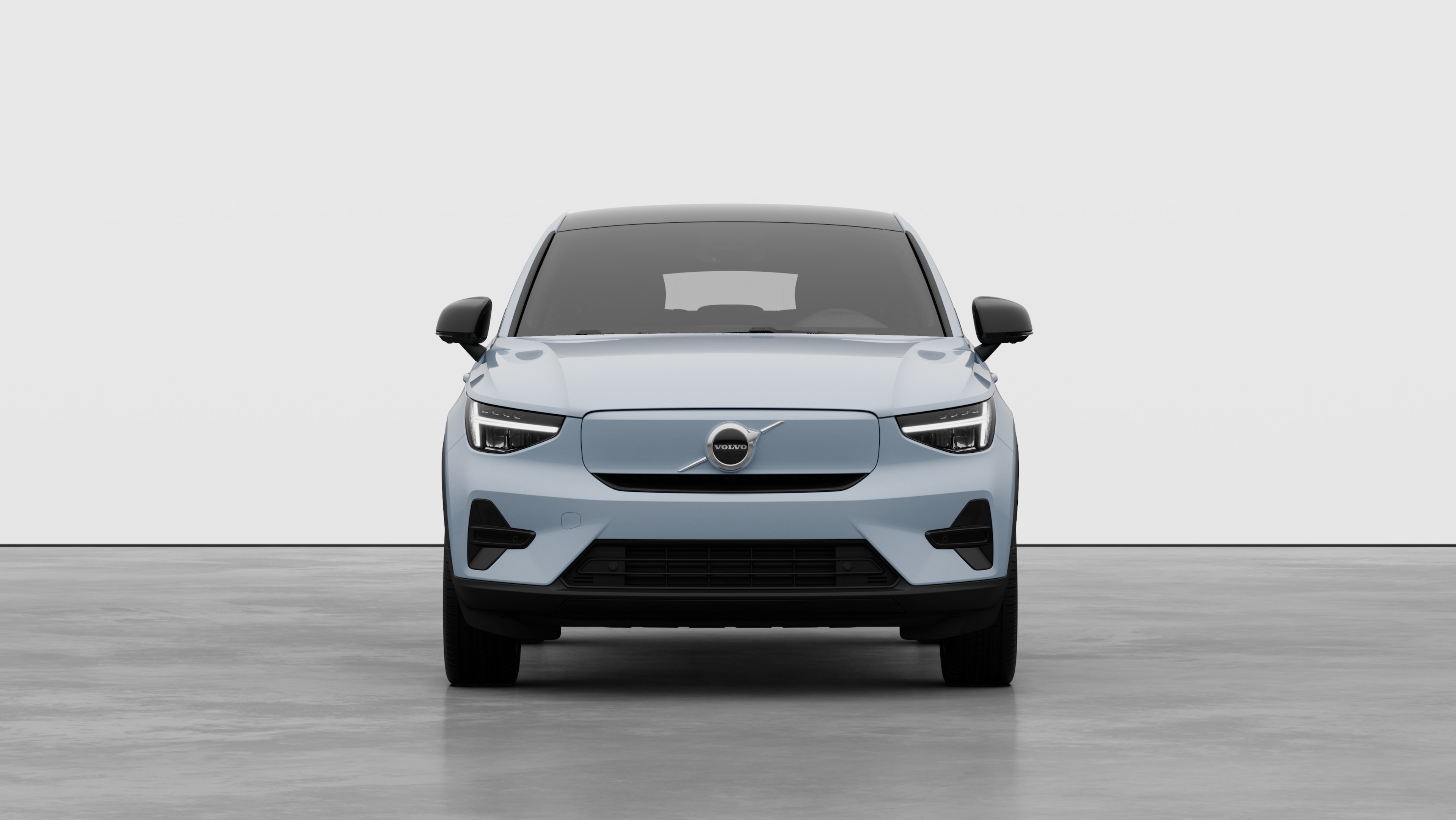 Front view of a Volvo car in a plain studio background.
