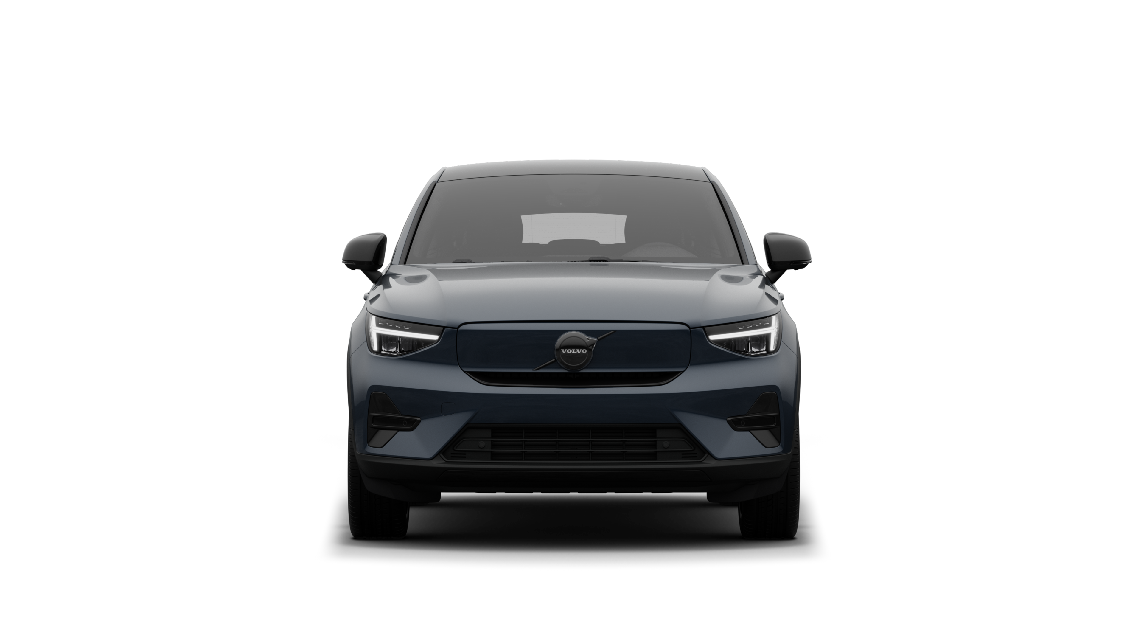 Vorderansicht eines Volvo vor dem Hintergrund eines schlichten Studios.