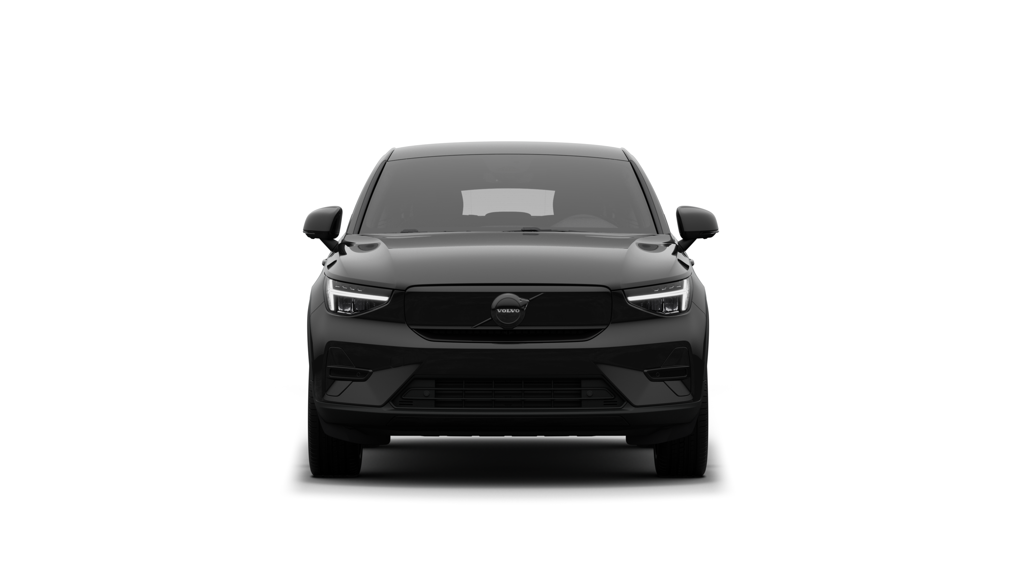 Vista frontal de um automóvel Volvo num fundo de estúdio simples.
