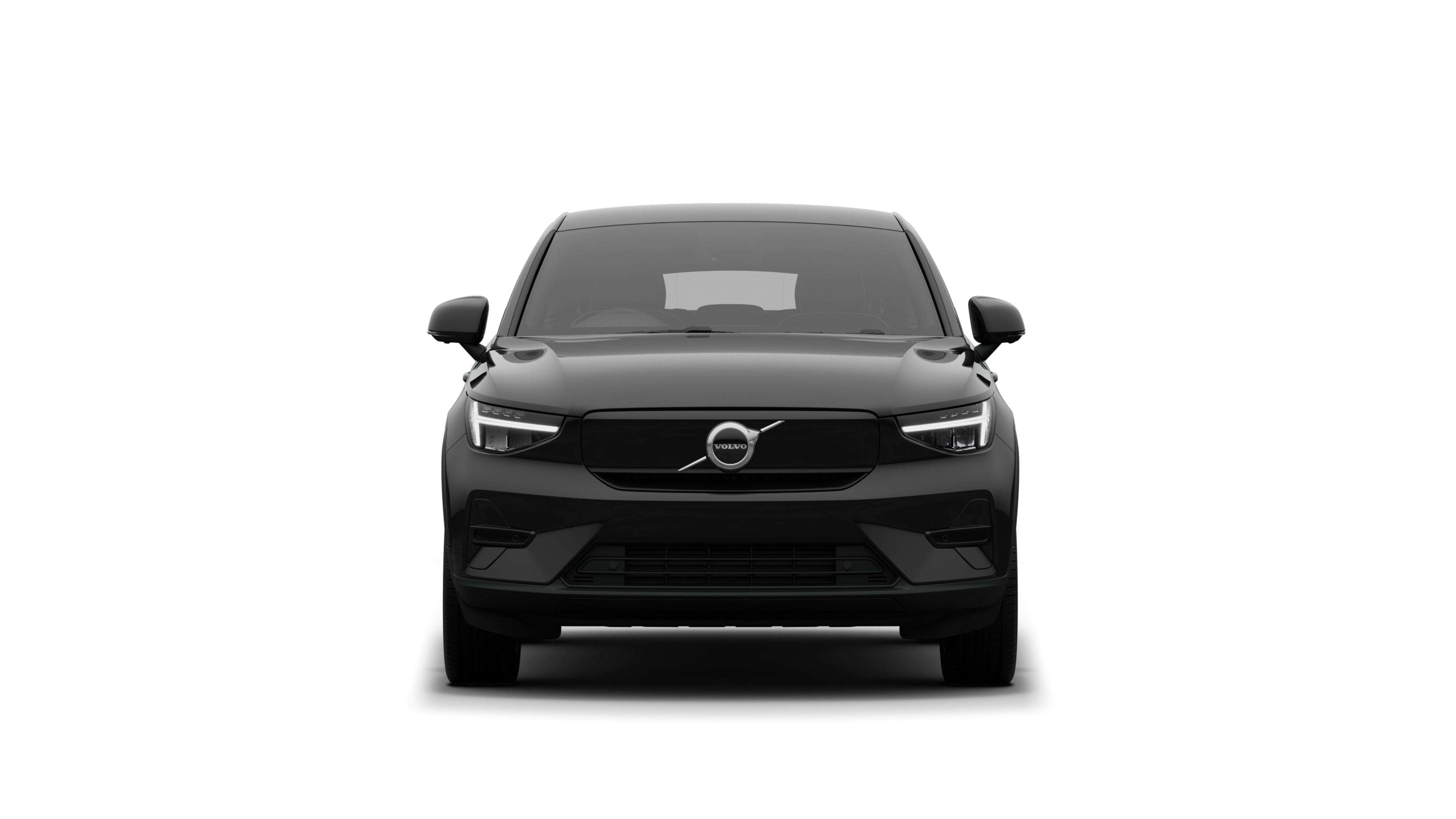 Front view of a Volvo car in a plain studio background.