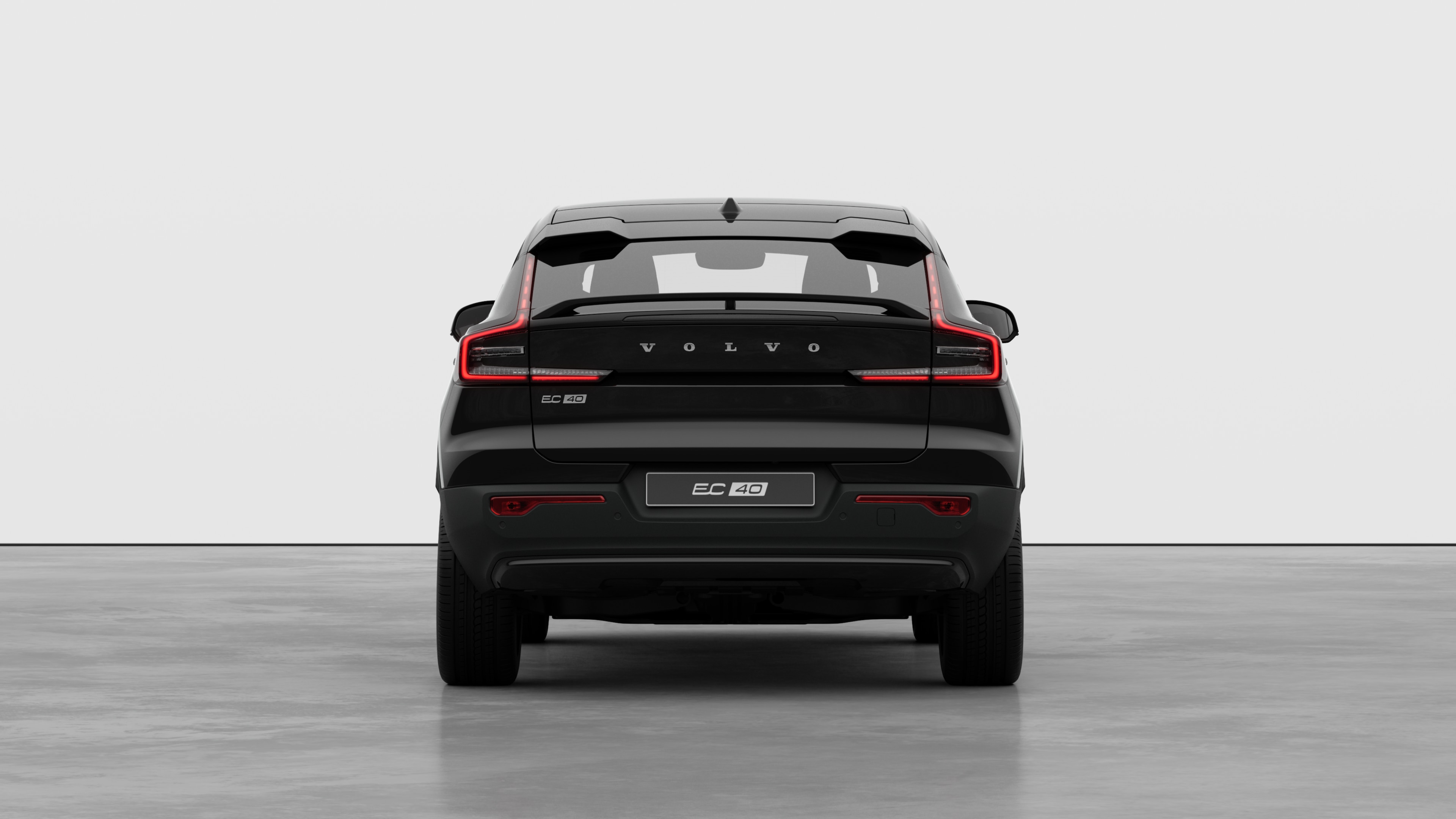 Volvo car rear view against a plain studio background.