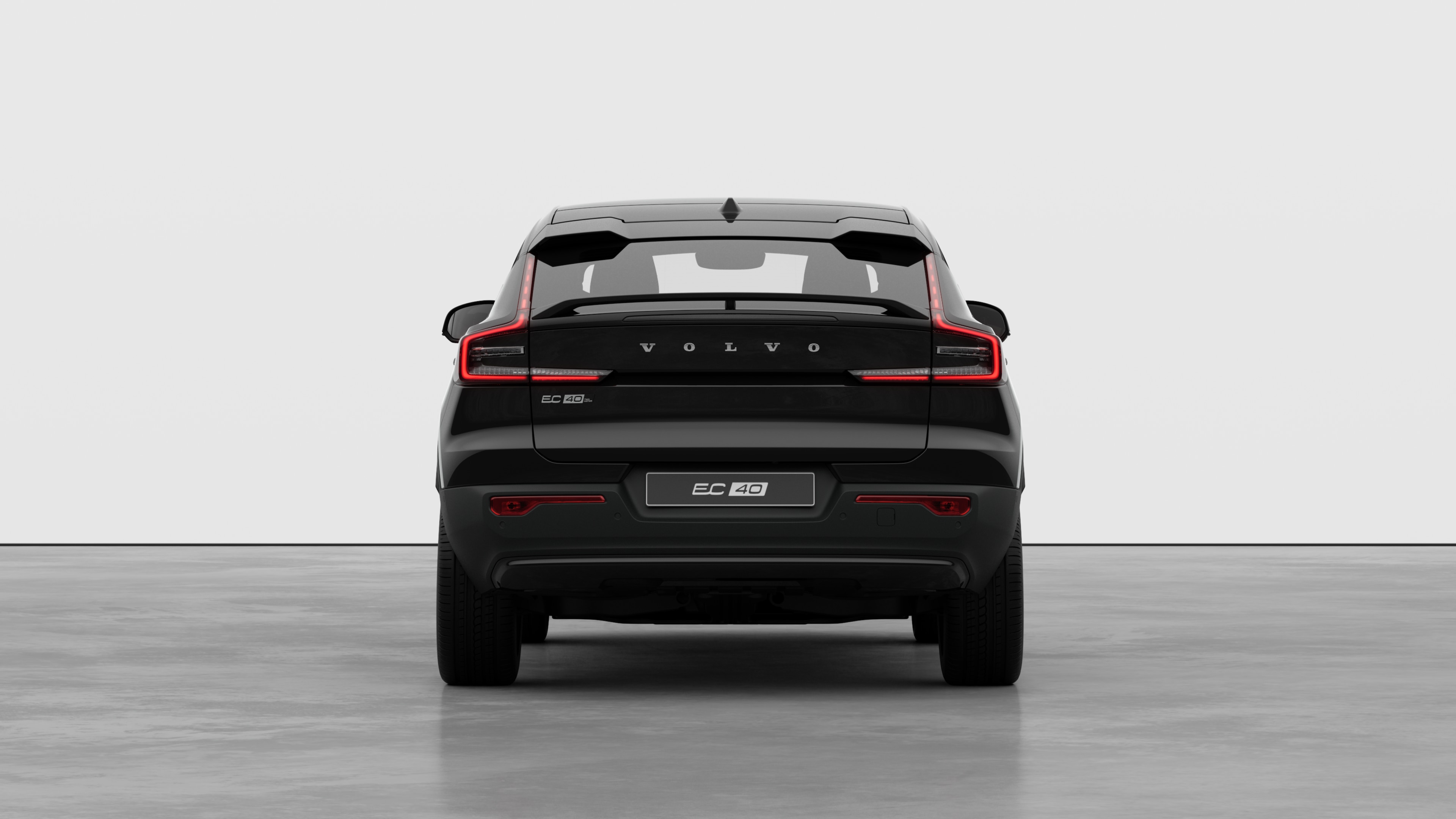 Volvo car rear view against a plain studio background.