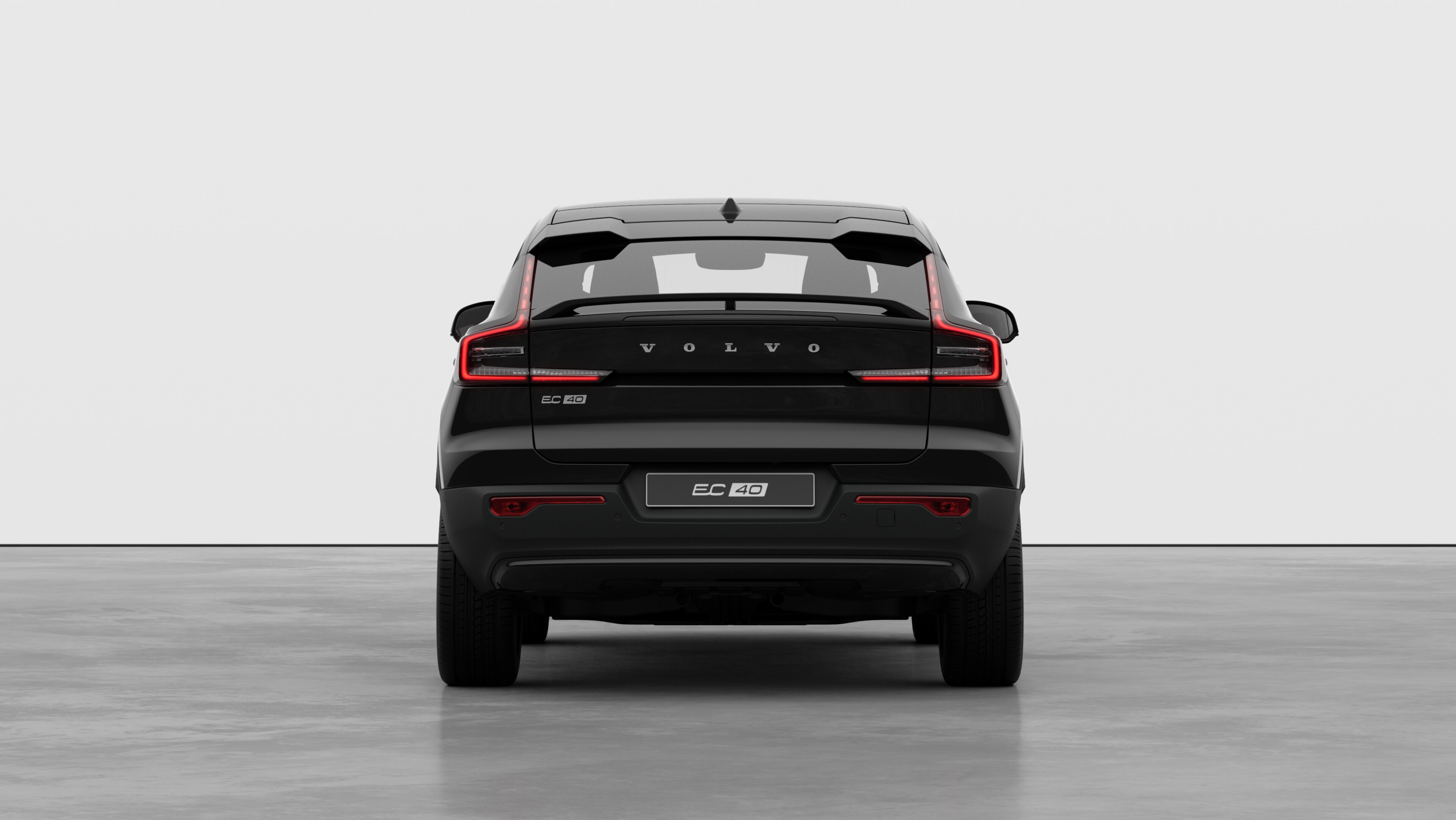 Volvo car rear view against a plain studio background.