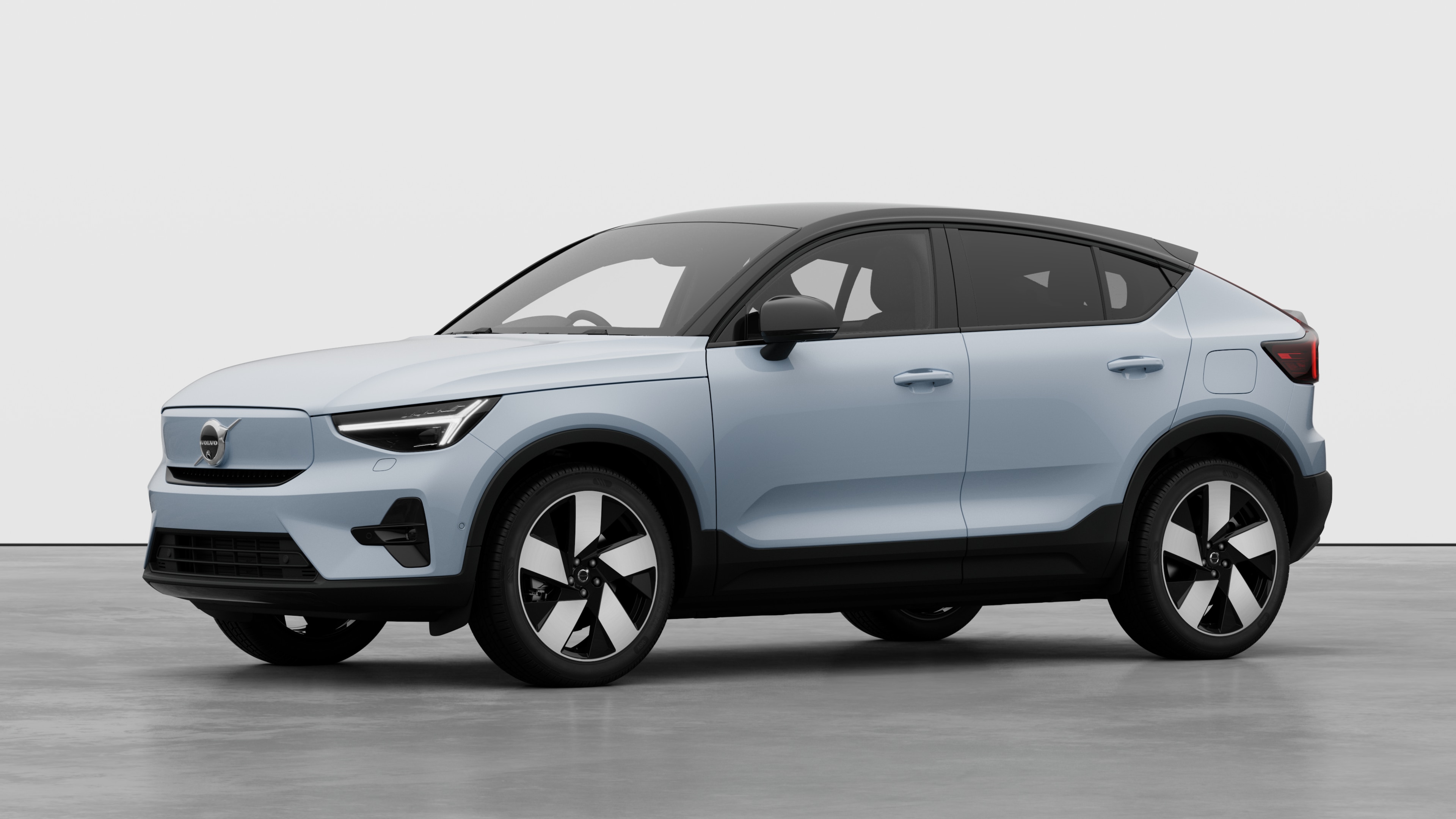 Volvo car exterior in three-quarter view, plain studio background.