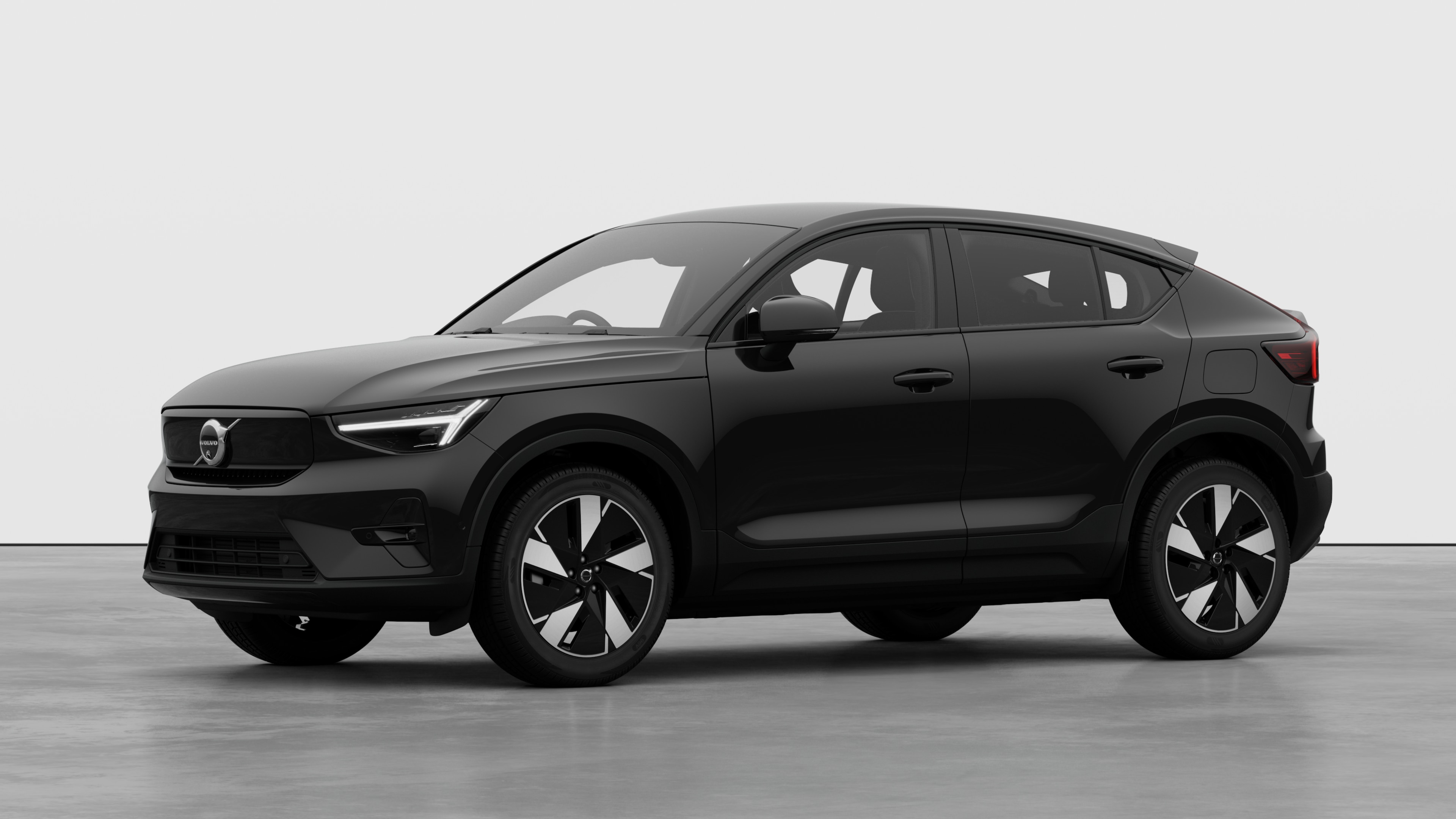 Volvo car exterior in three-quarter view, plain studio background.