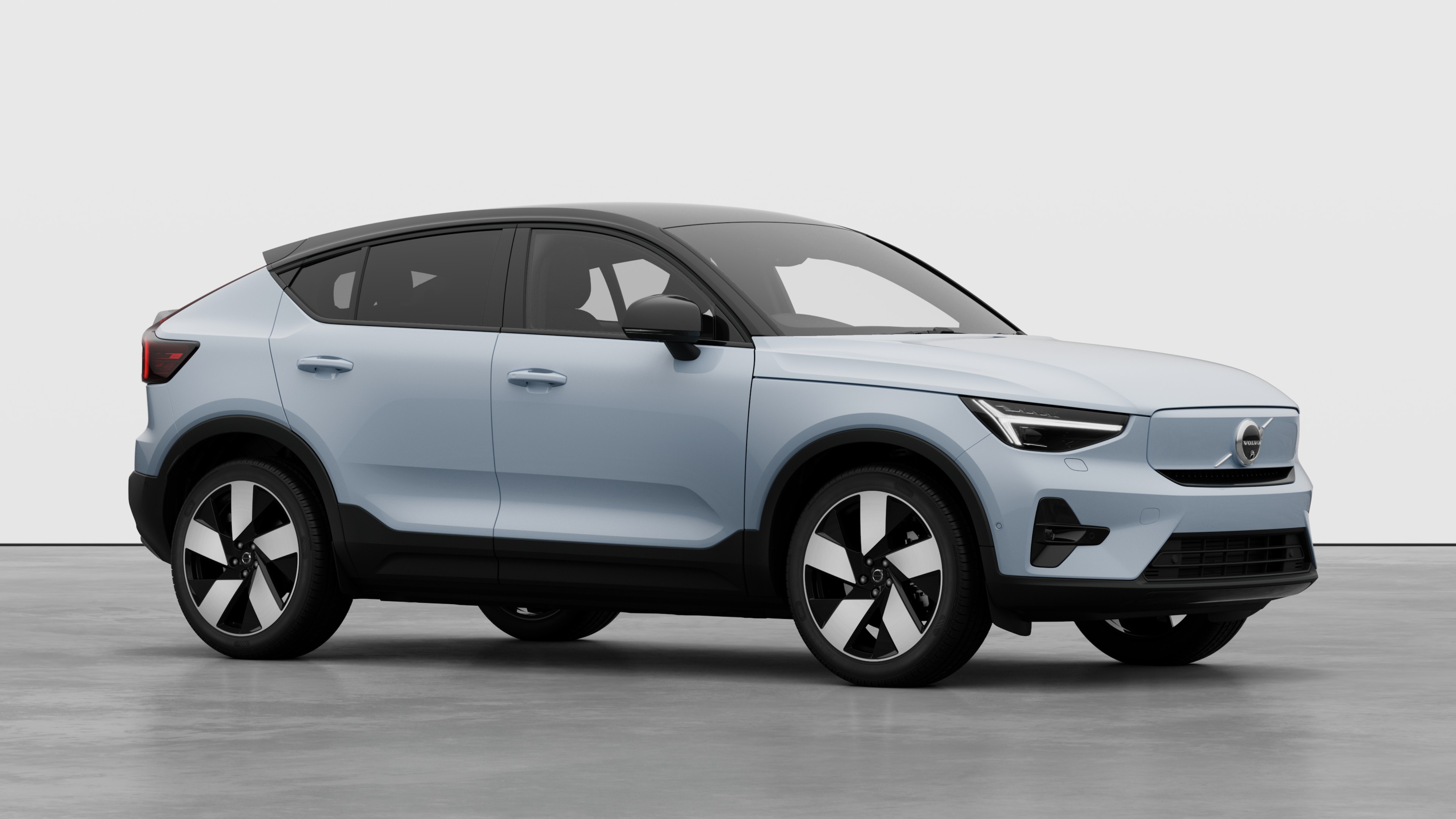 Volvo car exterior, three-quarter view in a plain studio background.
