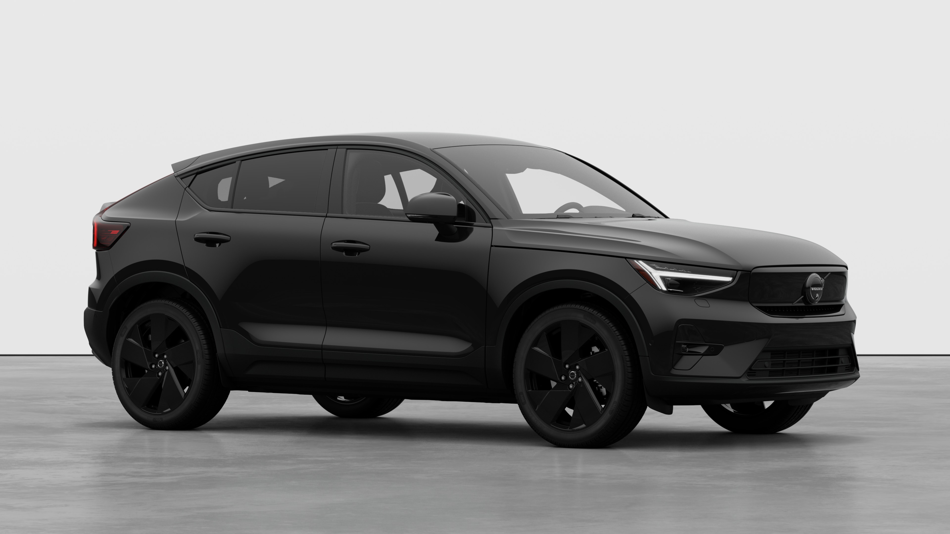 Volvo car exterior, three-quarter view in a plain studio background.