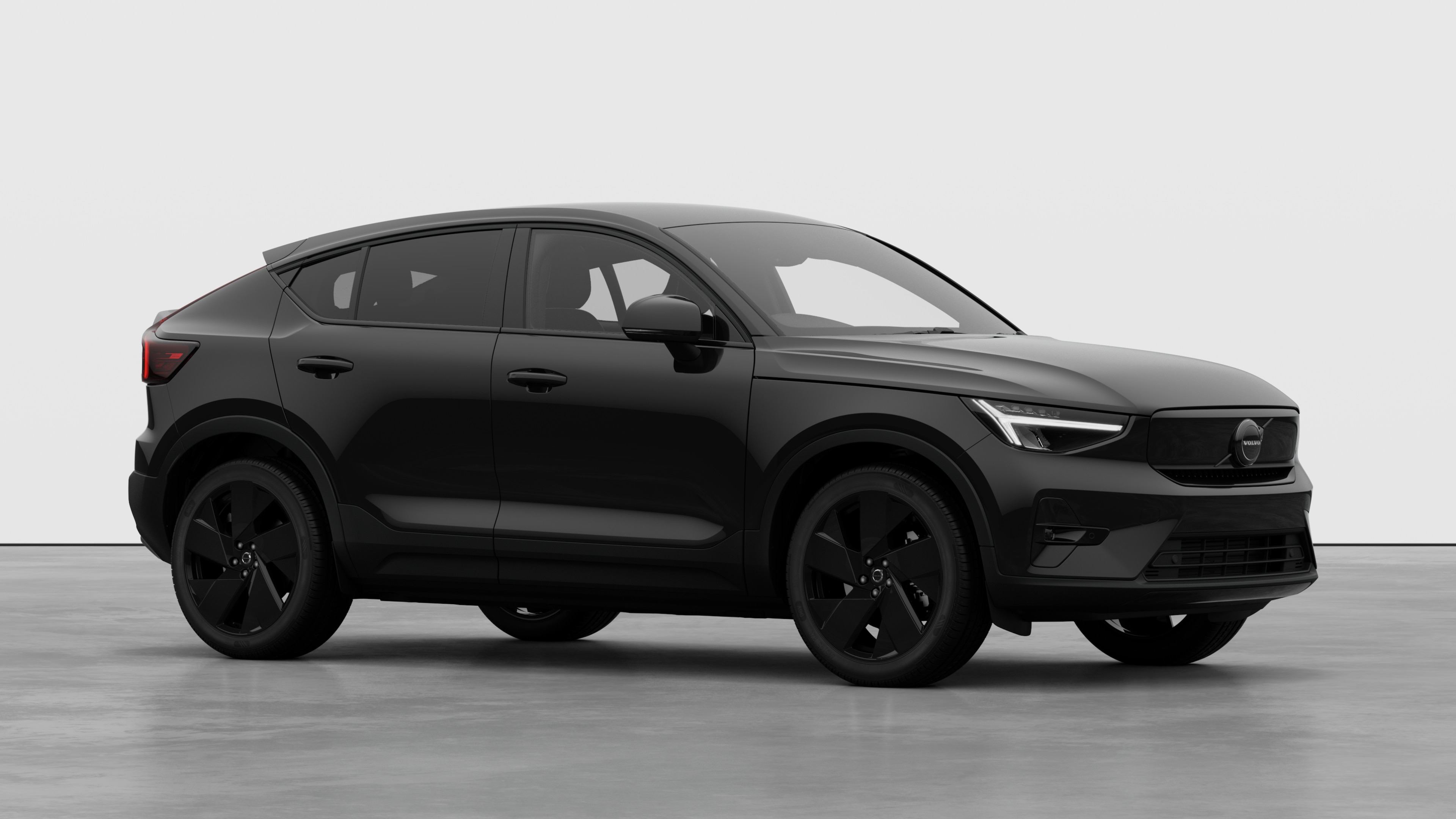 Volvo car exterior, three-quarter view in a plain studio background.