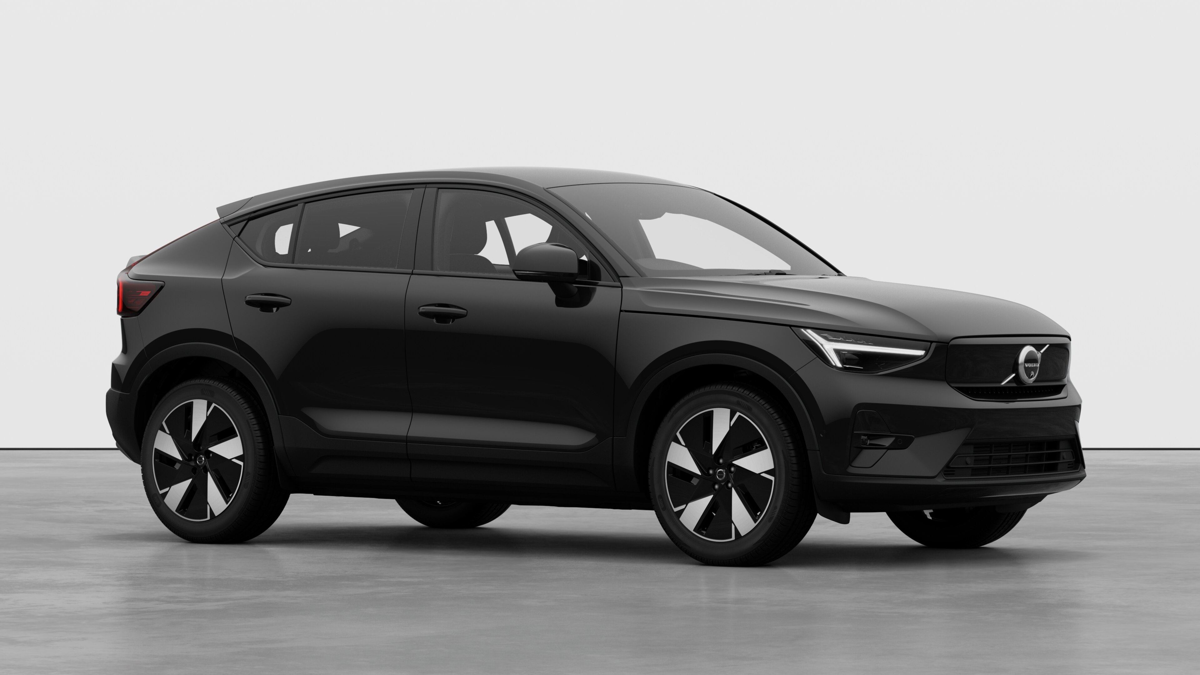 Volvo car exterior, three-quarter view in a plain studio background.