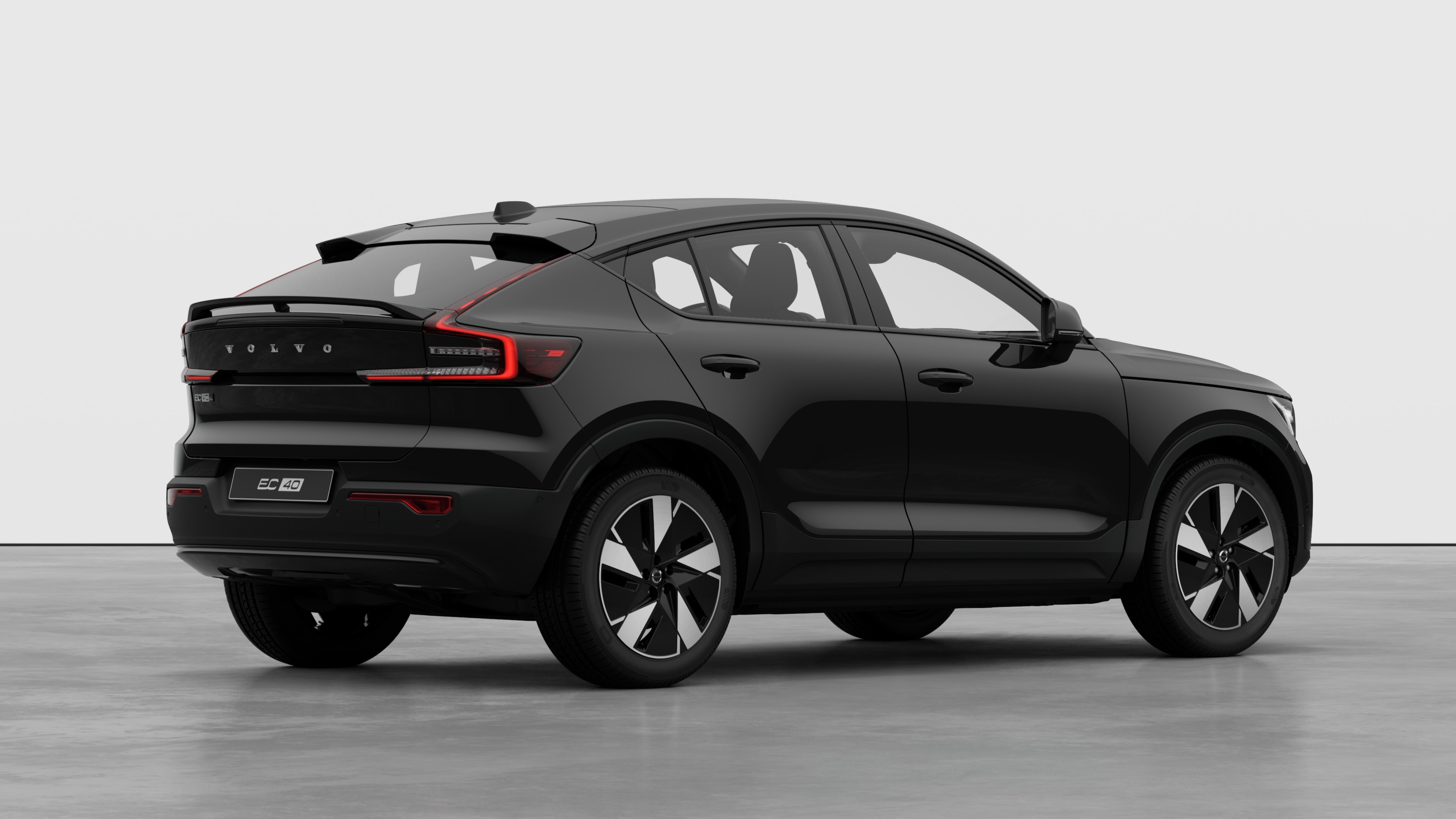 Volvo car rear three-quarter view on plain studio background.