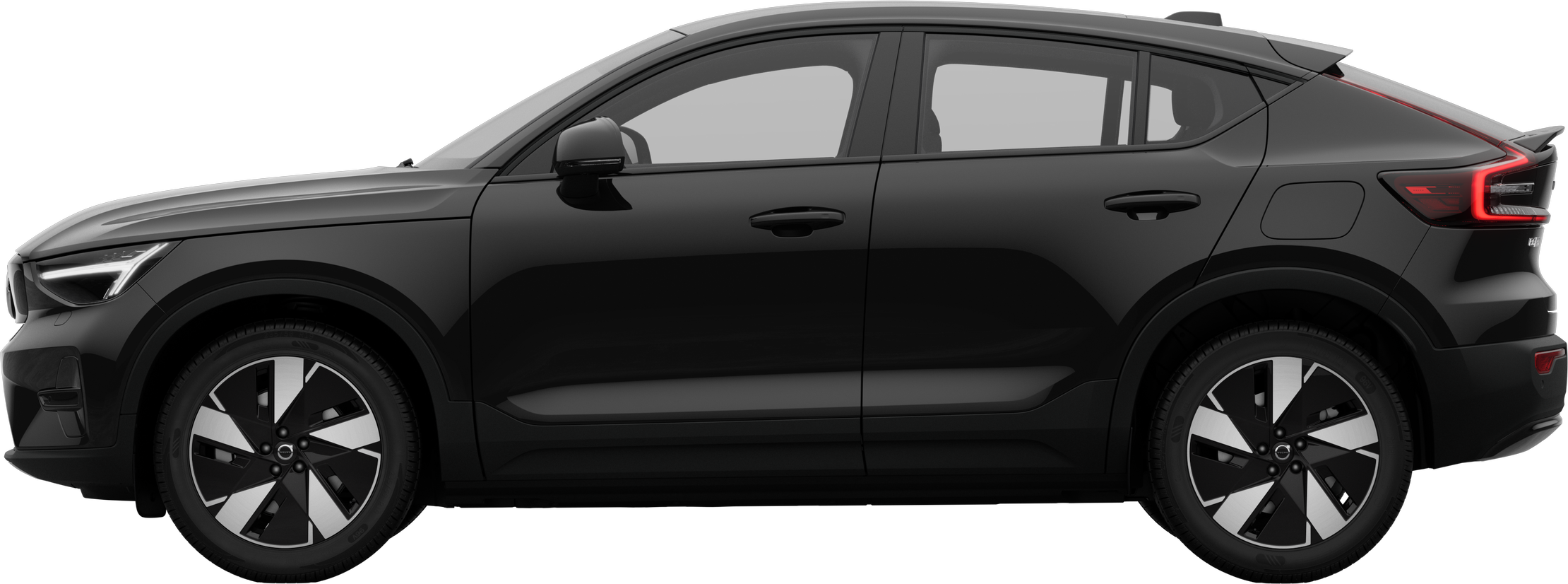 Vista lateral de um carro Volvo estacionado contra um plano de fundo de estúdio, mostrando o perfil e o design elegantes gerais do veículo.