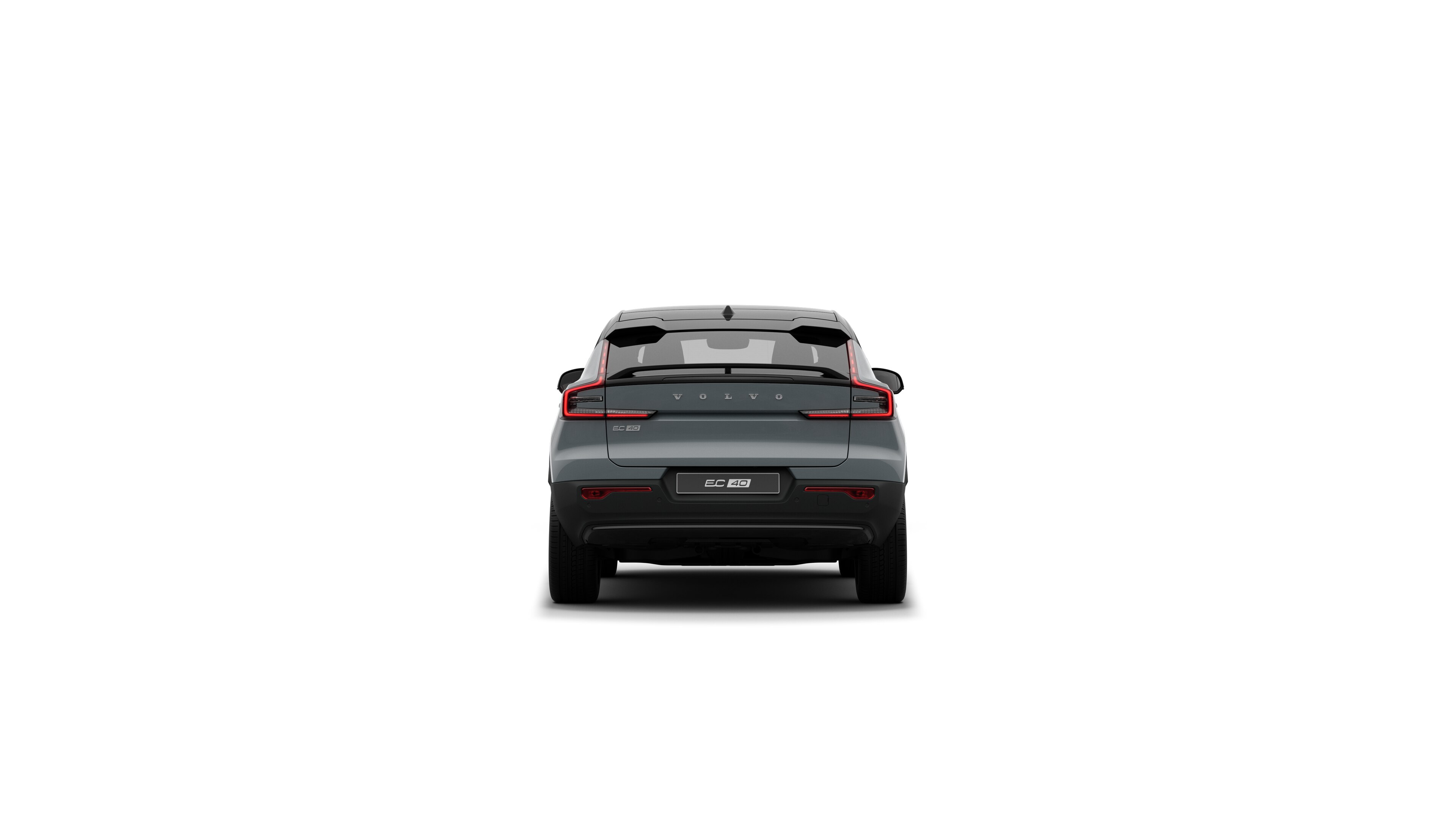 Volvo car rear view in a plain studio background.
