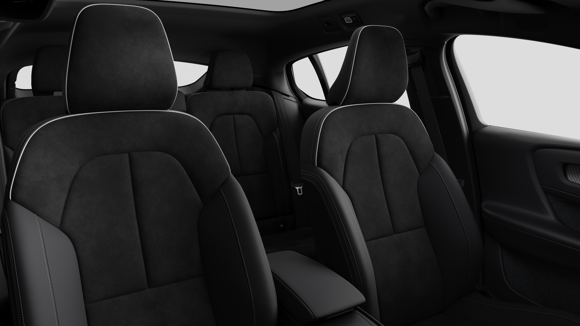 Volvo car interior showing rear passenger seats and center console in plain studio background.