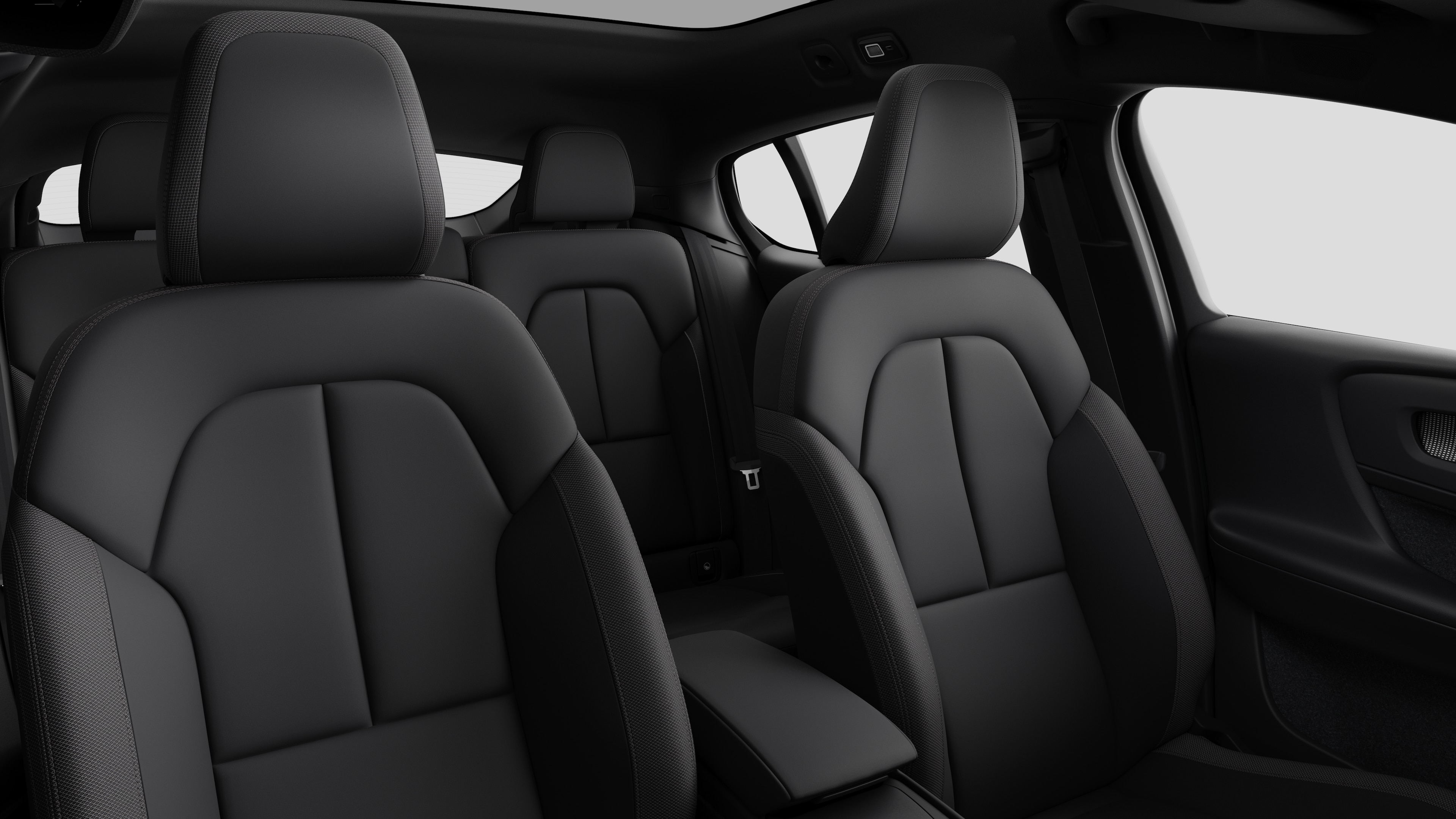 Volvo car interior showing rear passenger seats and center console in plain studio background.
