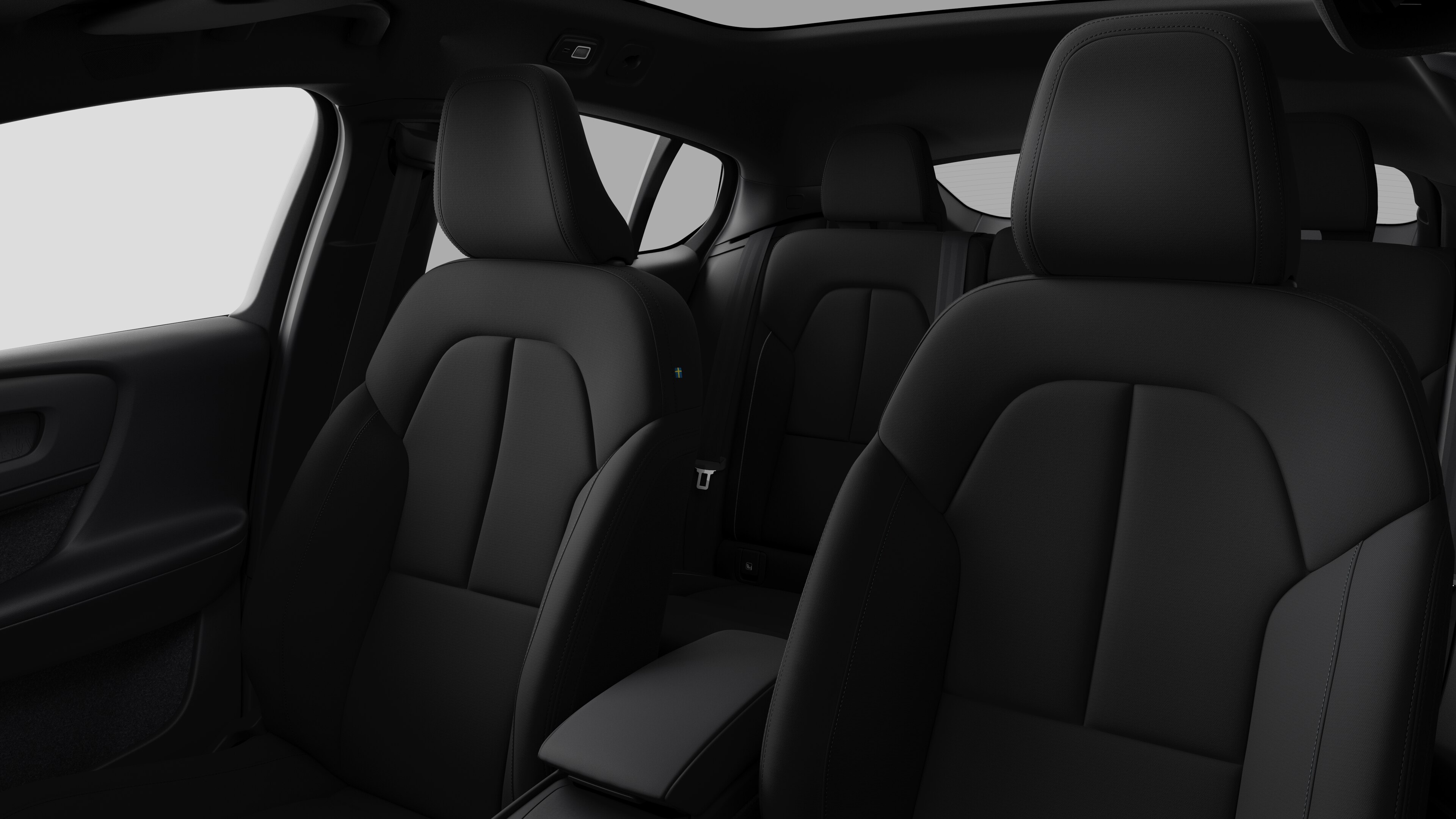 Intérieur d’une Volvo montrant les sièges passagers arrière et la console centrale dans un studio uni.