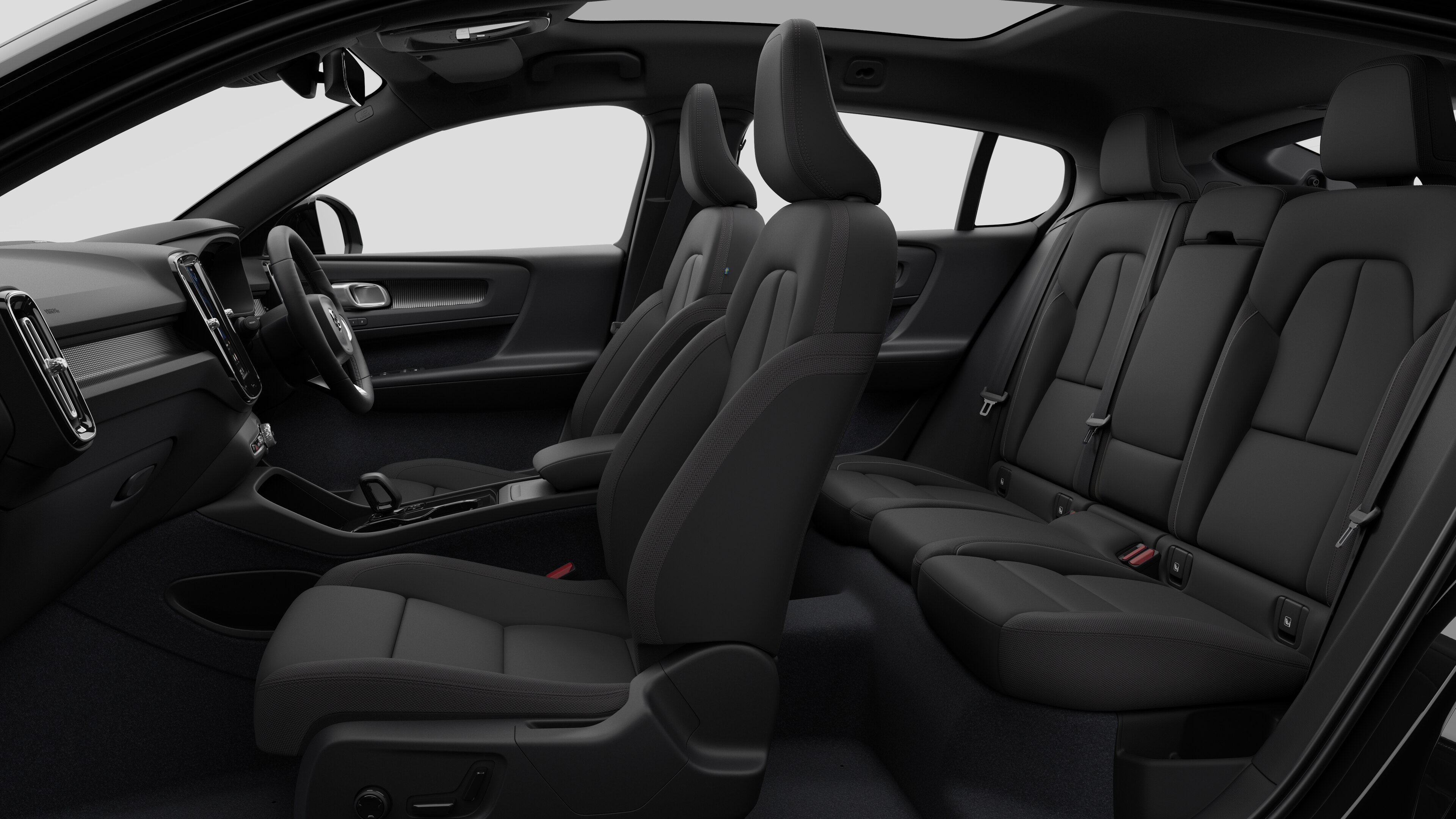 Volvo car interior side view showcasing front seats, rear passenger seats, steering wheel, dashboard, and center console, set against plain studio background.