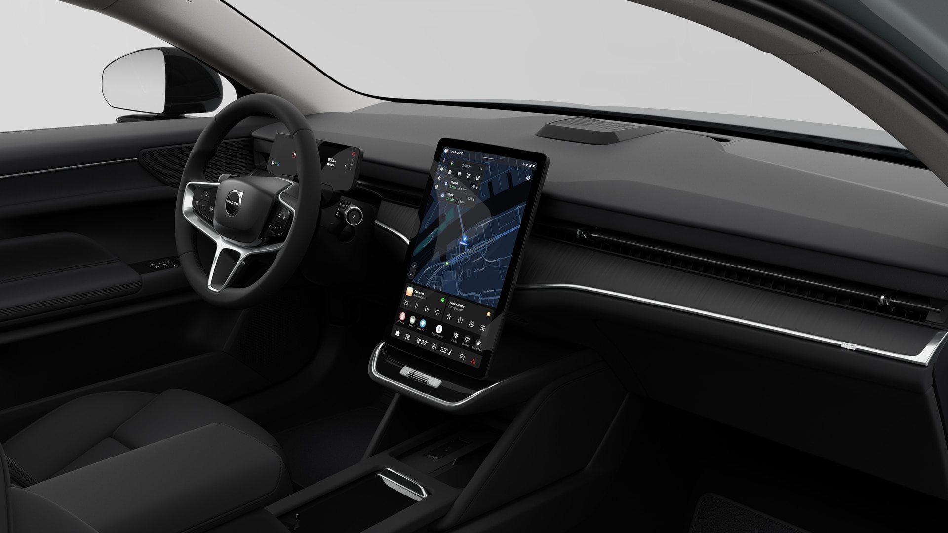 Vue intérieure d’une voiture Volvo montrant le tableau de bord, le volant, la console centrale et l’écran d’affichage numérique dans un arrière-plan studio uni.