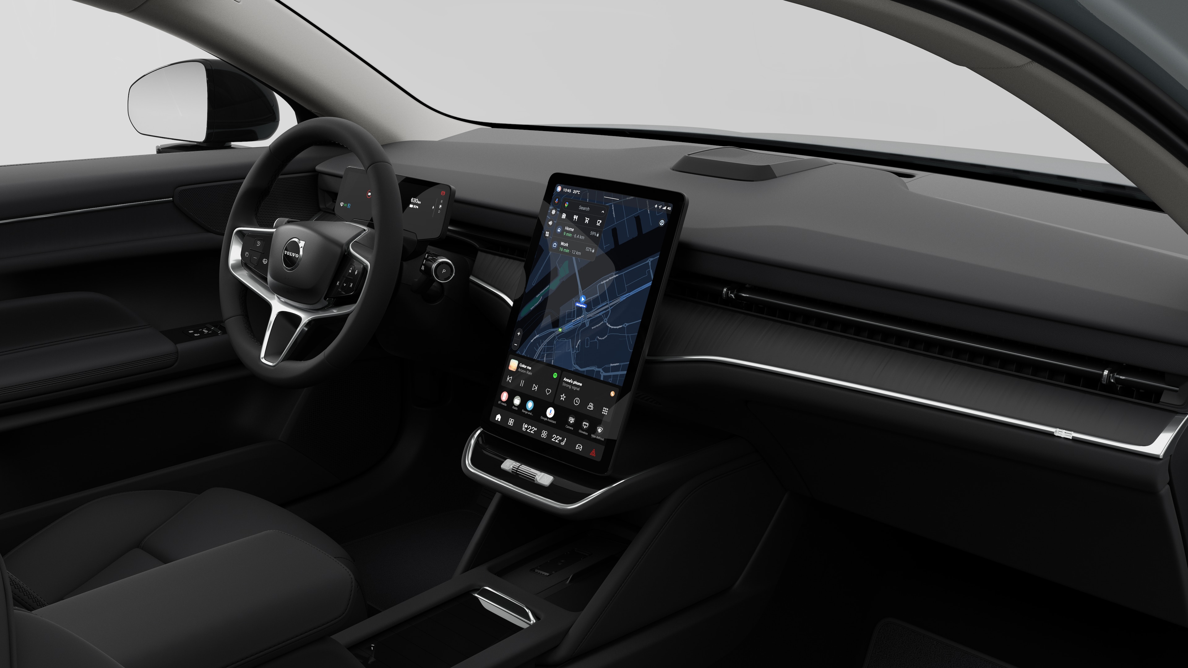 Интериорен изглед на автомобил Volvo, показващ арматурното табло, волана, централната конзола и цифровия дисплей на обикновен студиен фон.